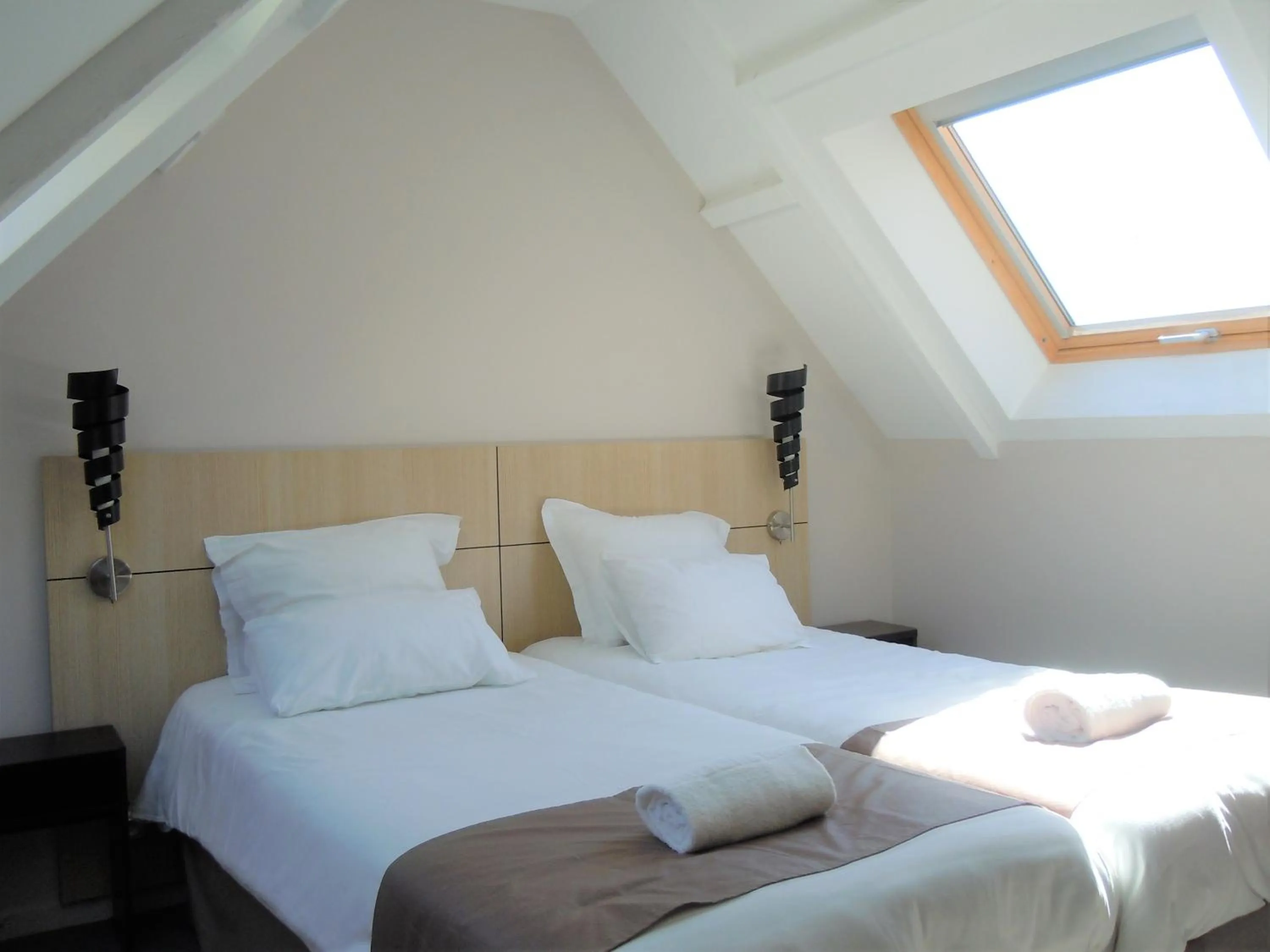 Bed in Sweet Home Appart'Hôtel Deauville Sud