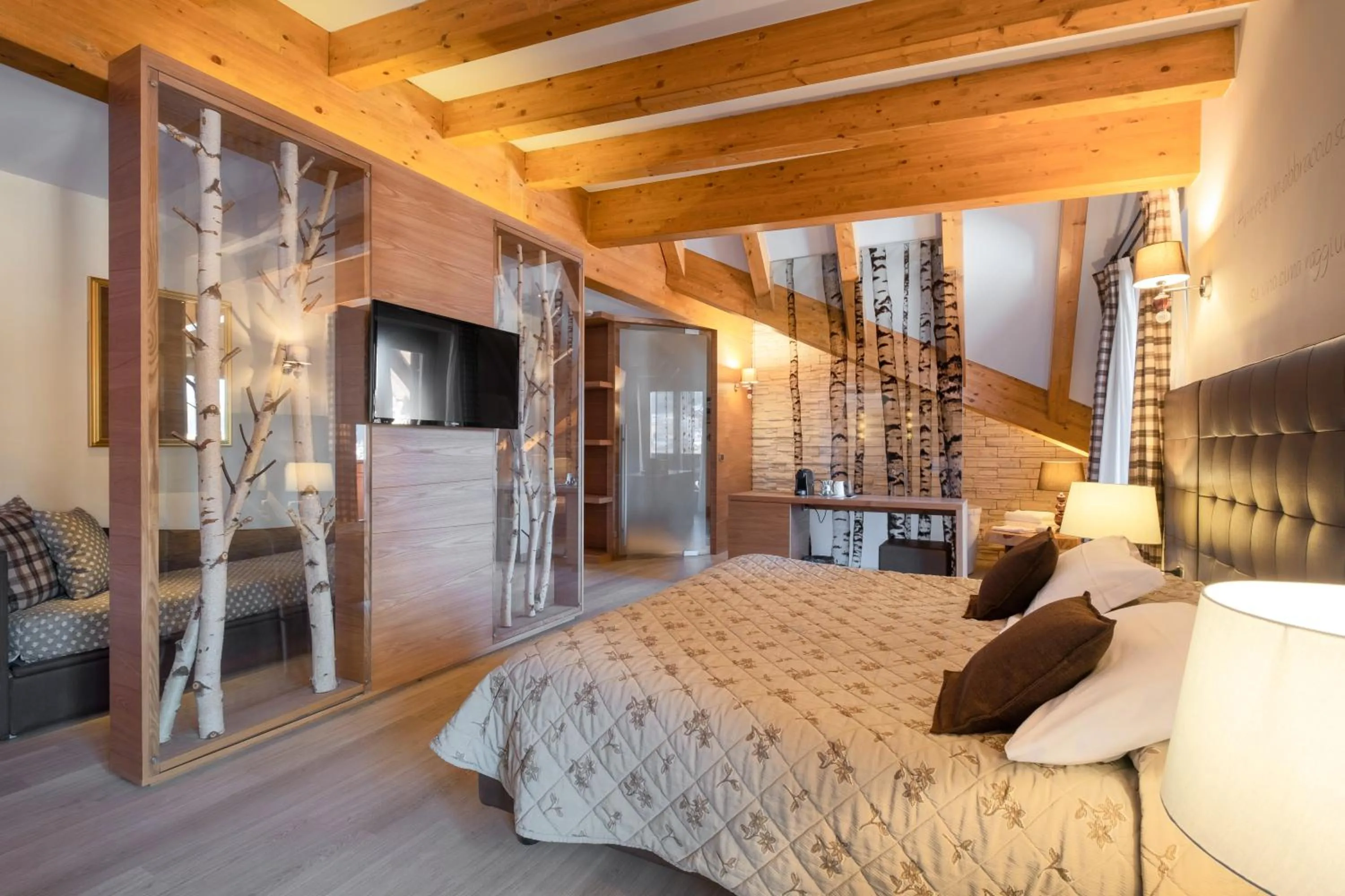Photo of the whole room, Bed in Il Piccolo Dolomiti Resort