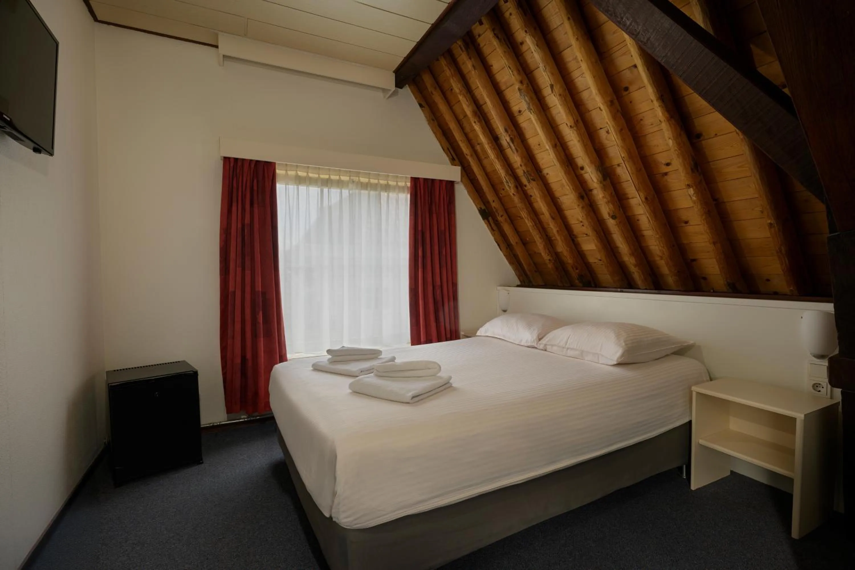 Bed in Atlas Village Brielle