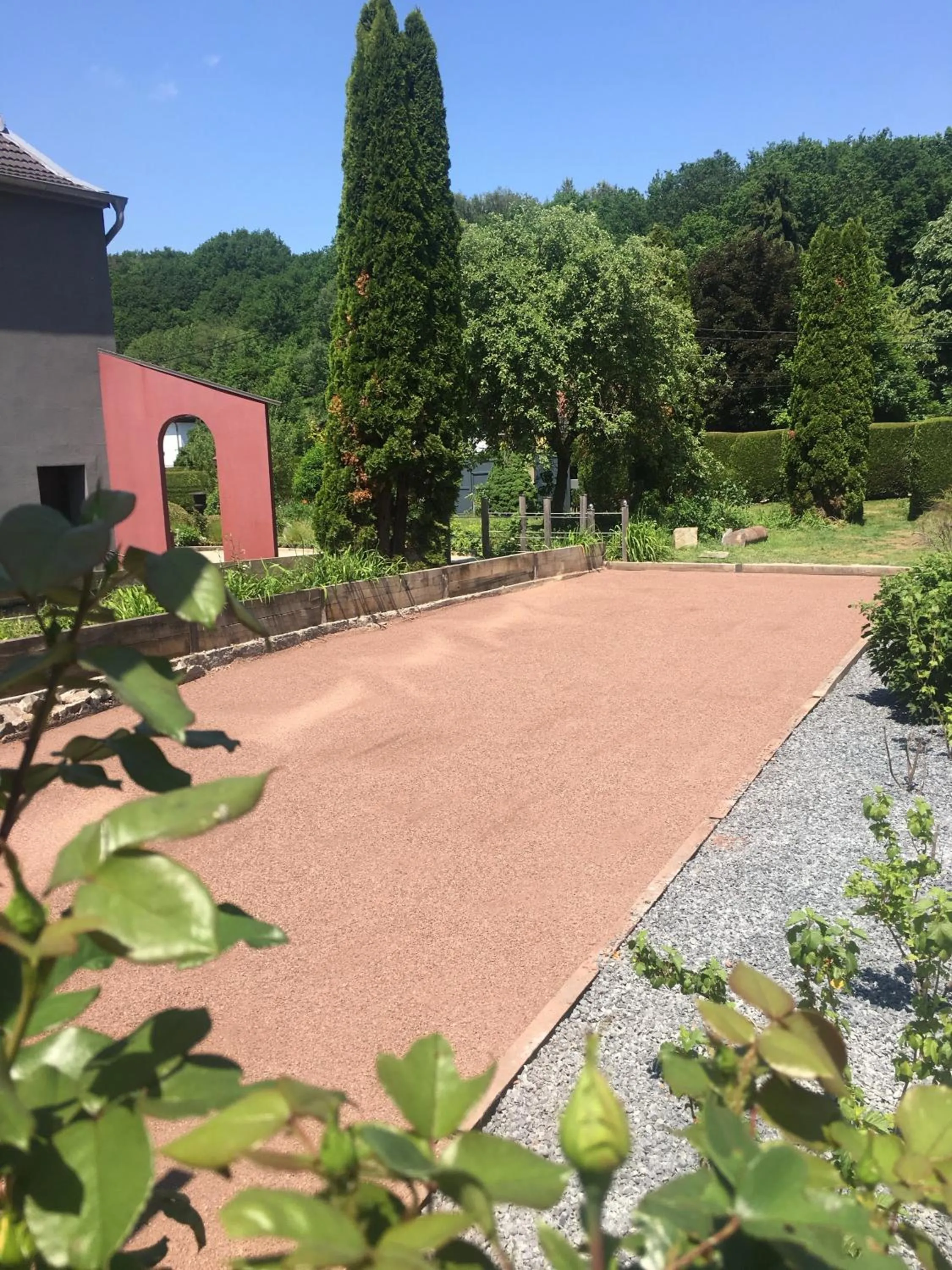 Garden view in Logis Hôtel DOMAINE du MOULIN