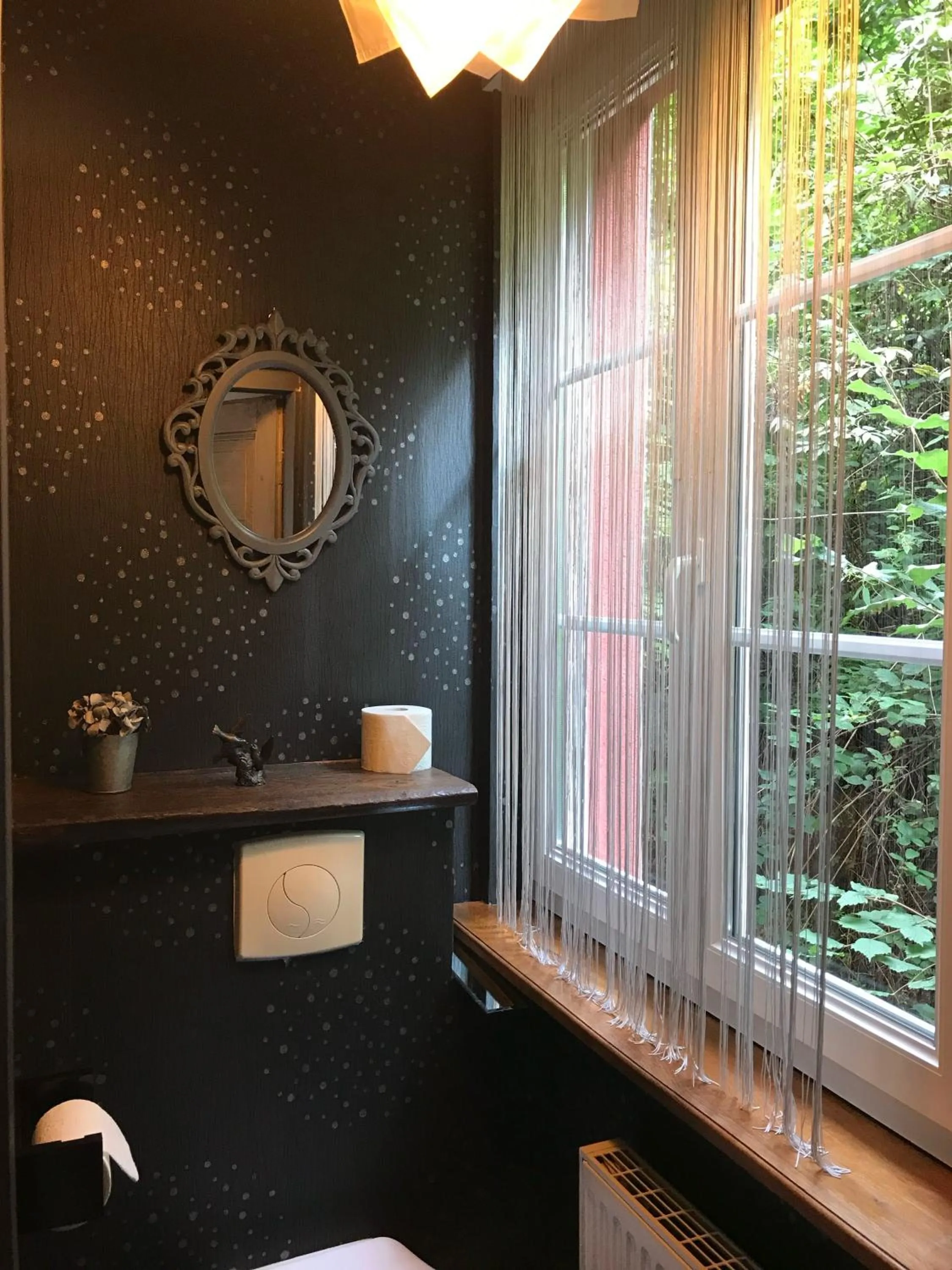 Bathroom in Logis Hôtel DOMAINE du MOULIN