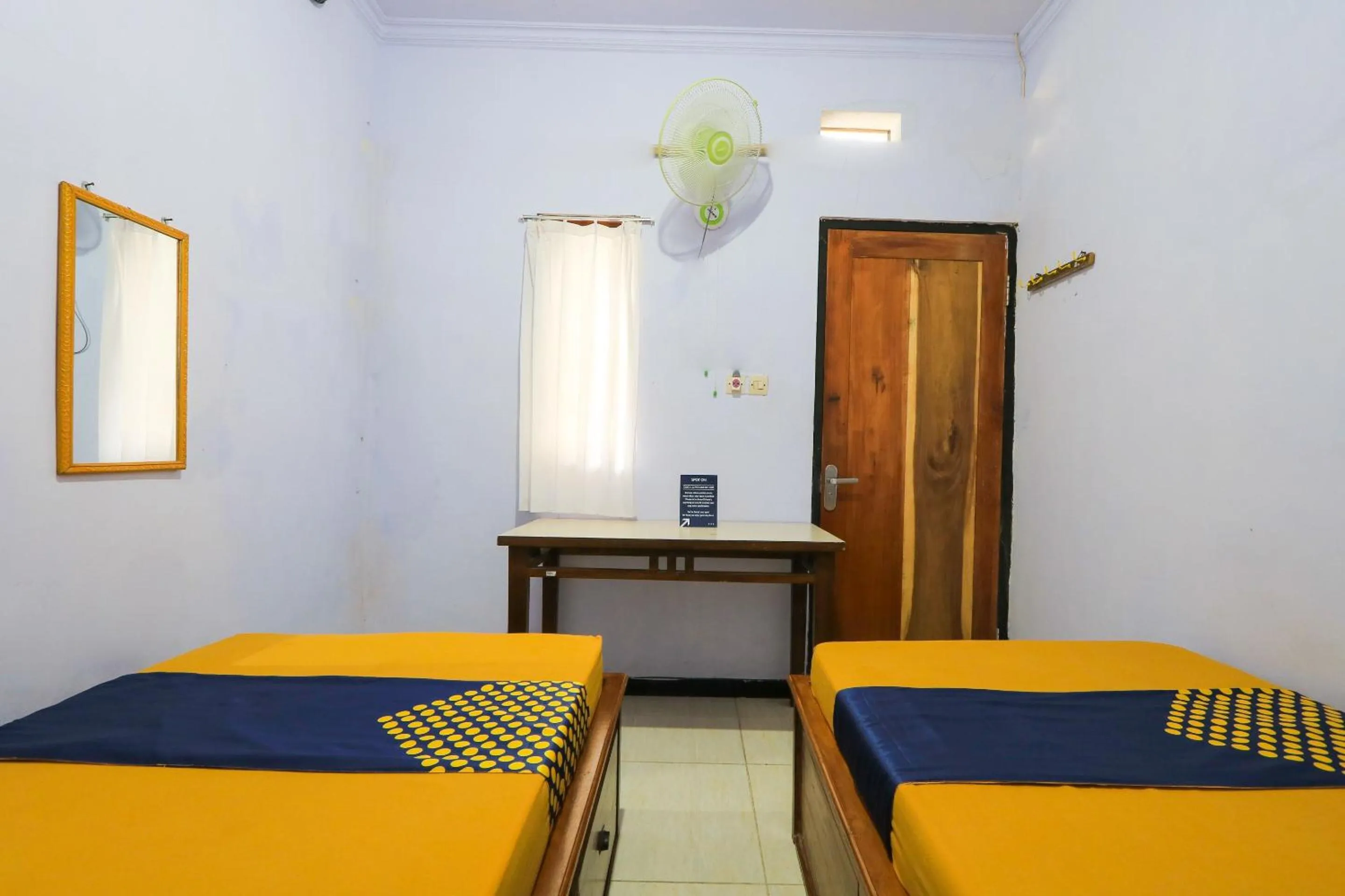 Bedroom in OYO 2497 Pesona Guest House