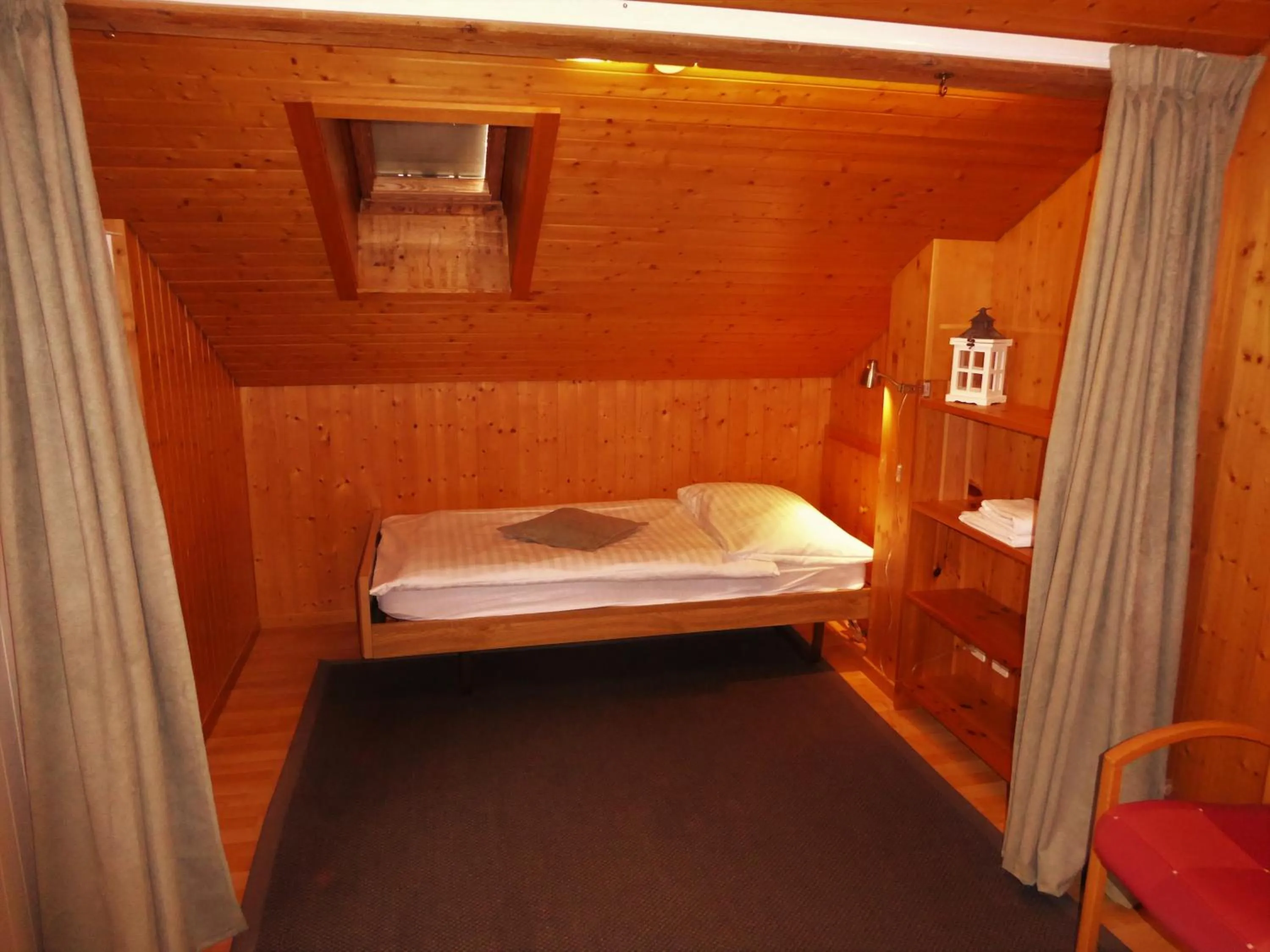 Bed in Hotel Tell and Apartments