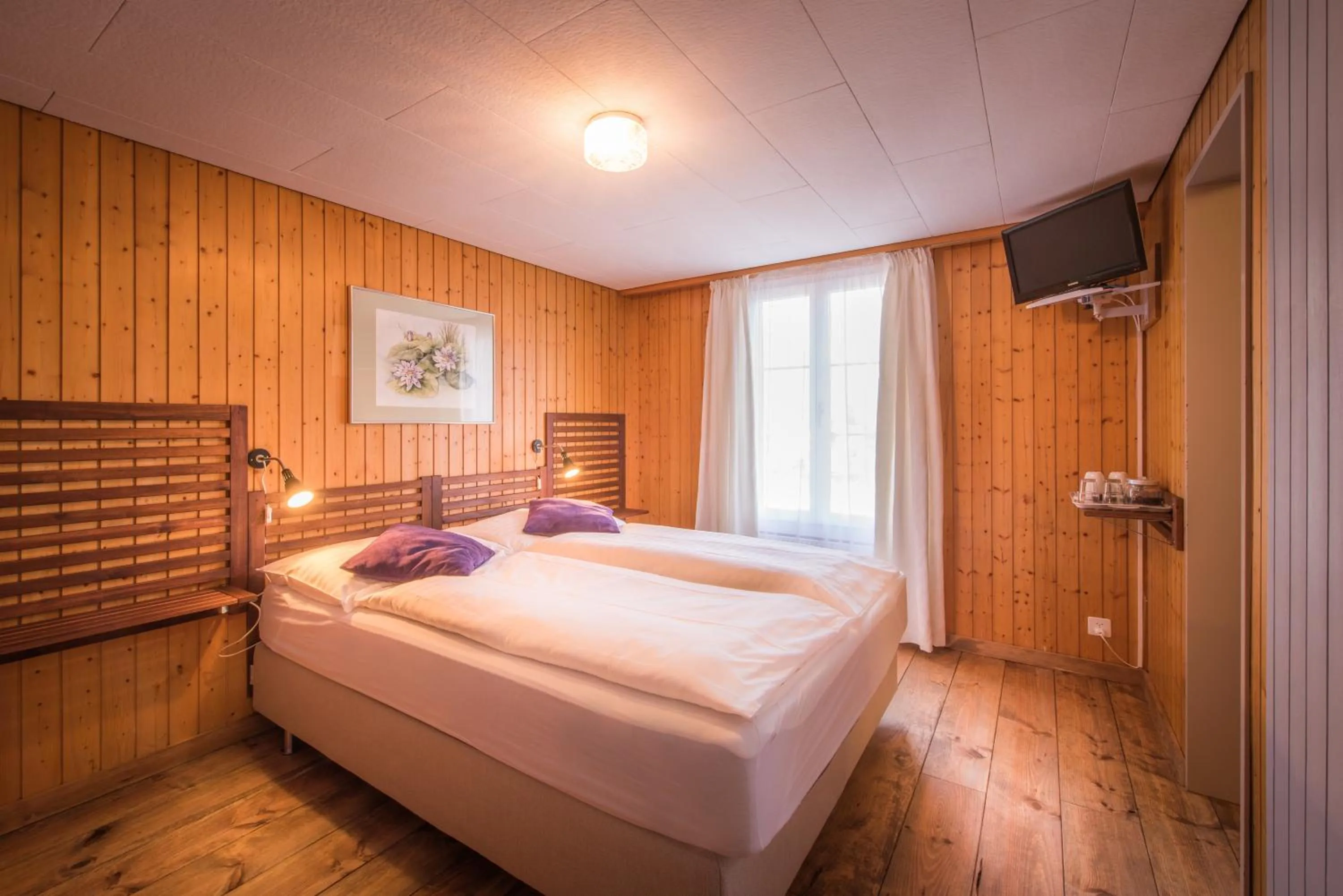 Day, Bed in Hotel Tell and Apartments