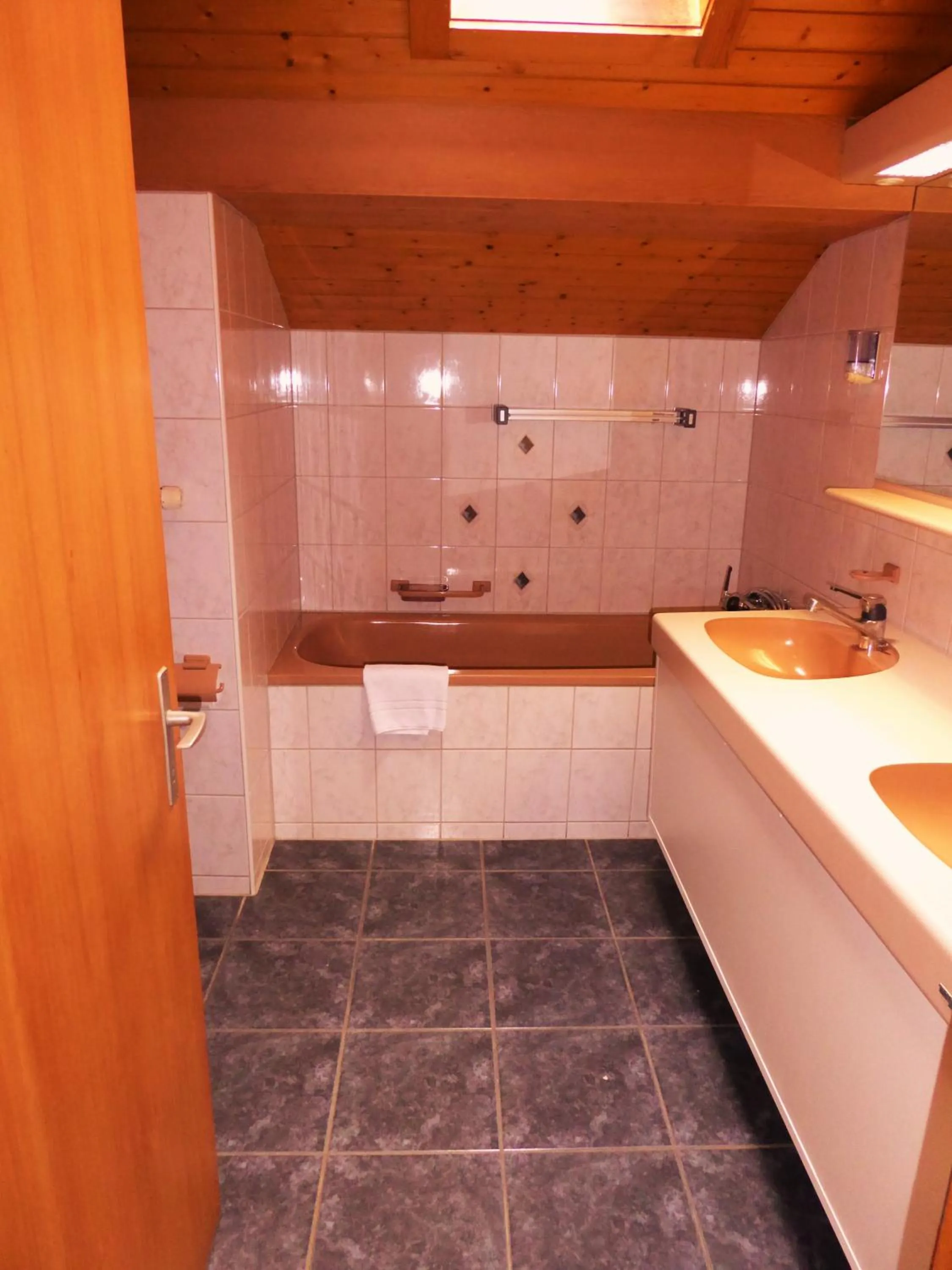 Bathroom in Hotel Tell and Apartments