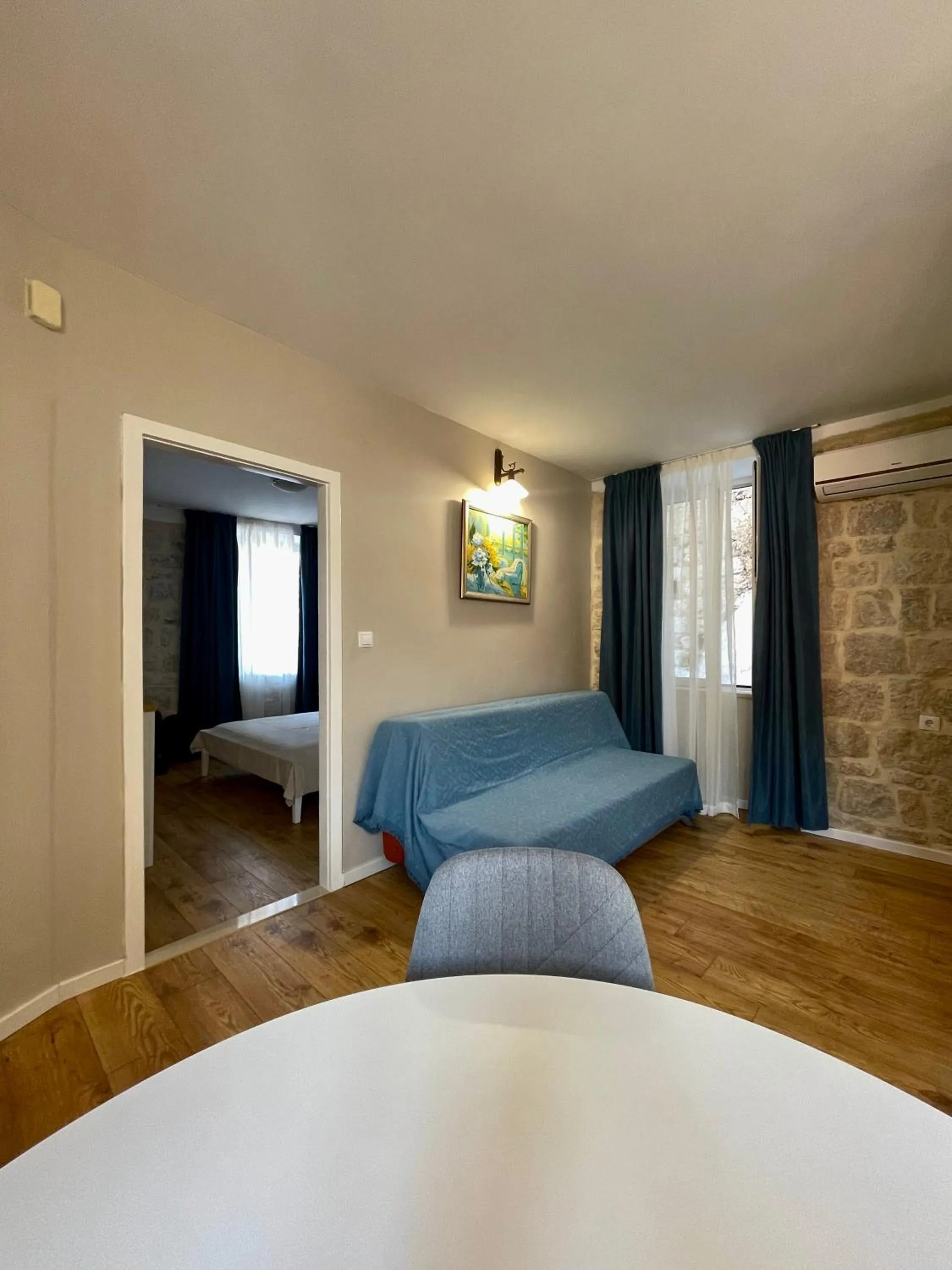 Communal lounge/ TV room, Bed in Apartments Mia