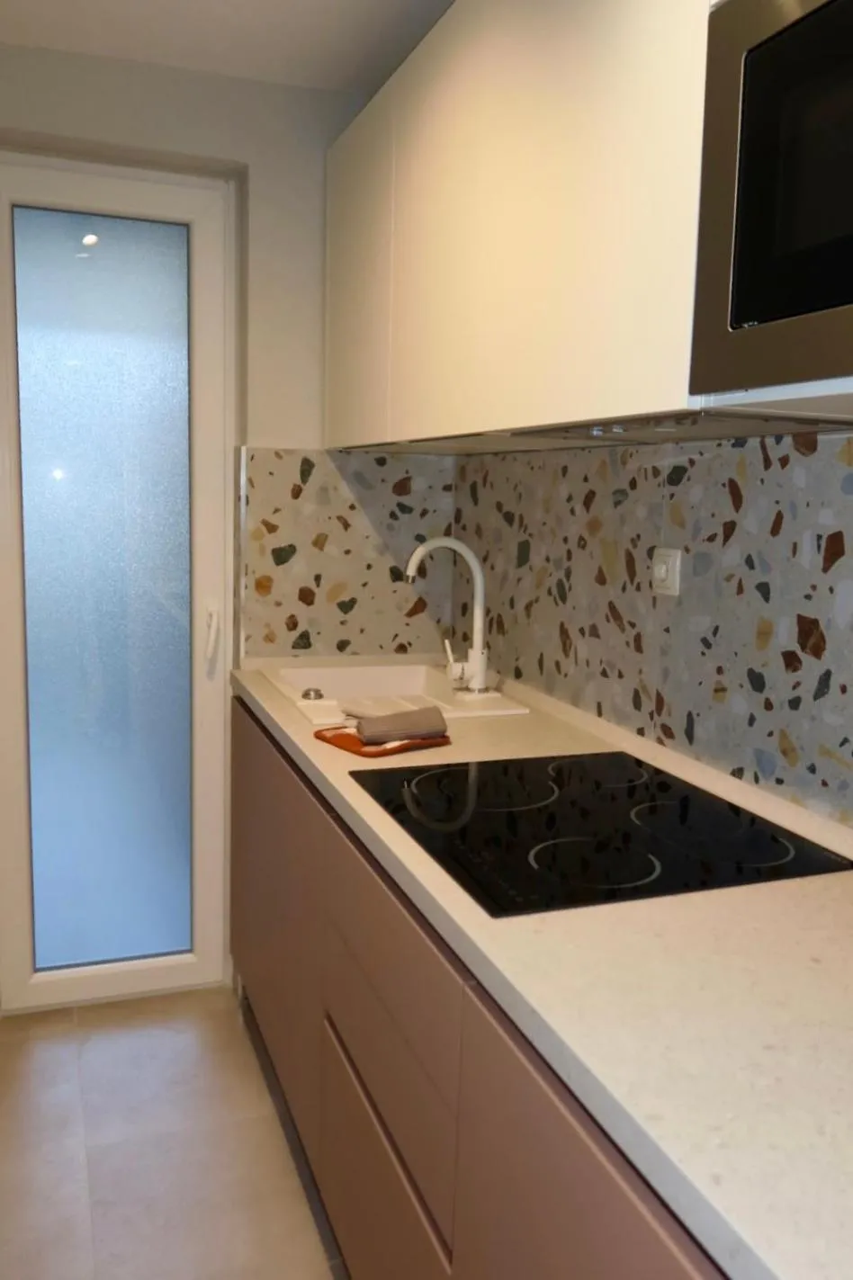 Kitchen or kitchenette in Apartments Mia