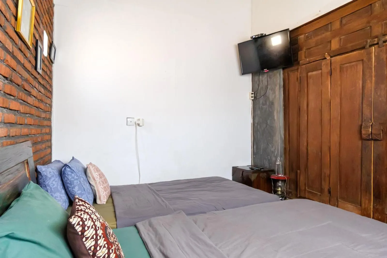 Bed in TwoSpaces Living at Bunga Desa, Jimbaran