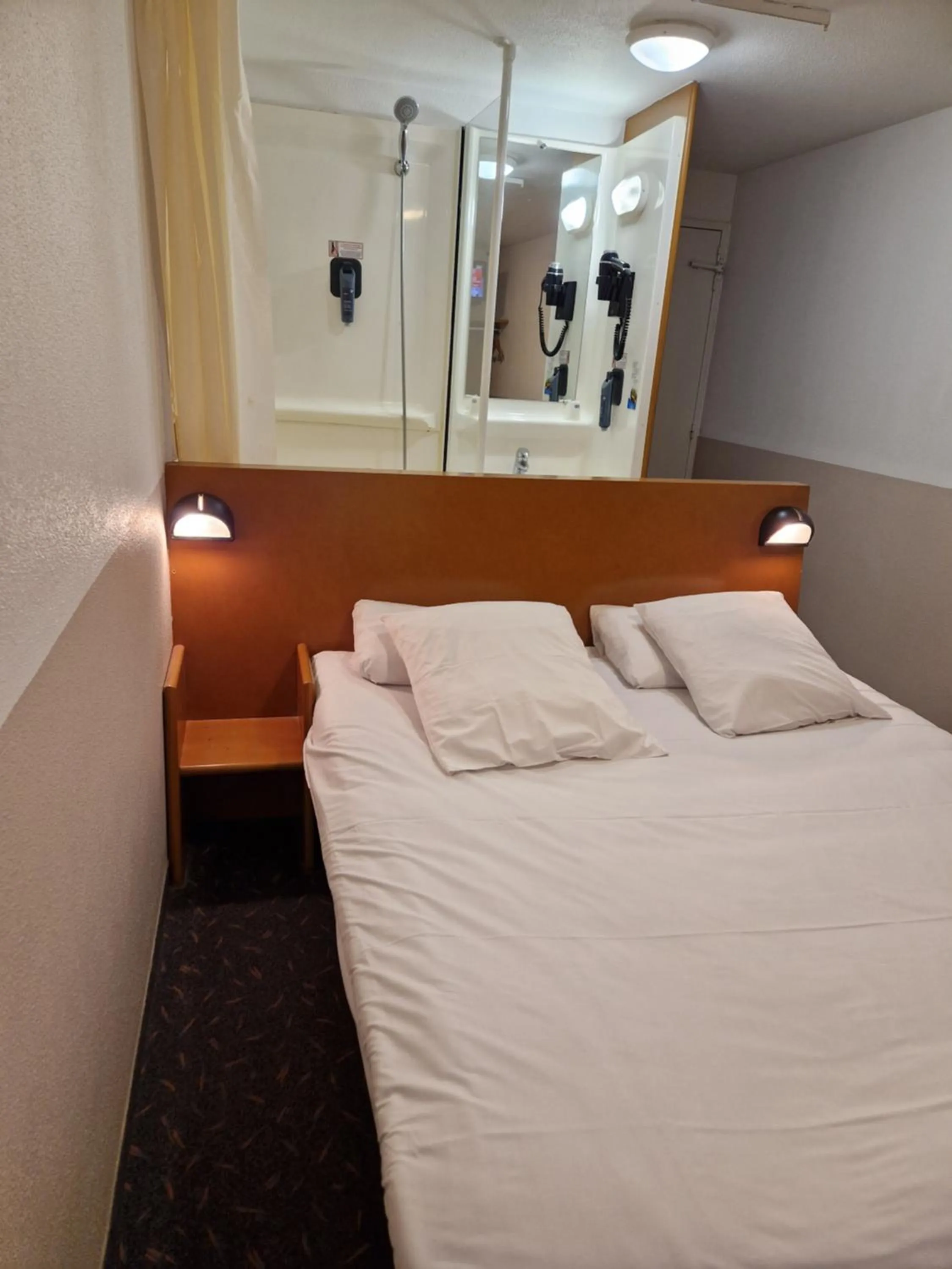 Bed in Quick Palace Vannes