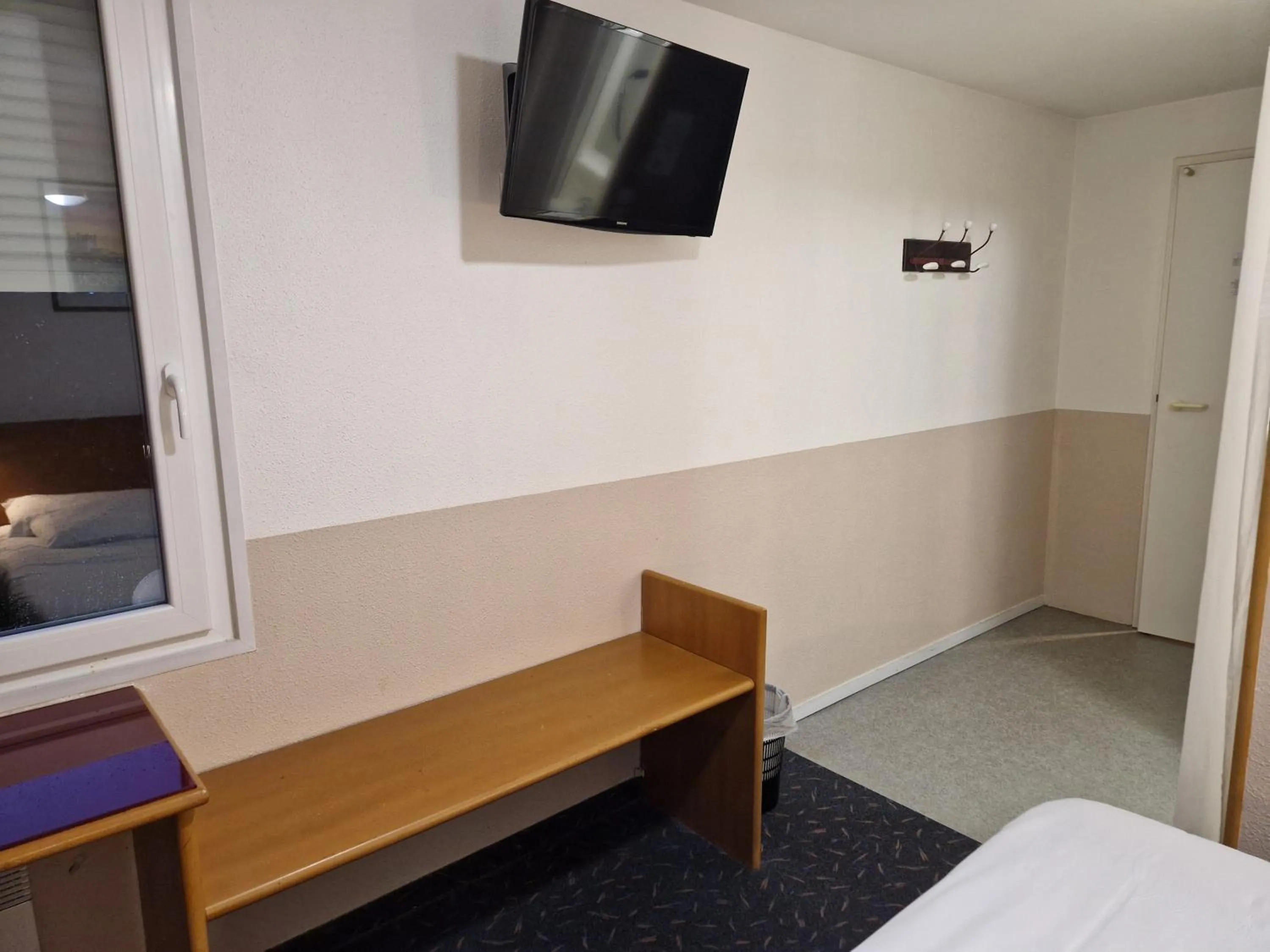 Bed in Quick Palace Vannes