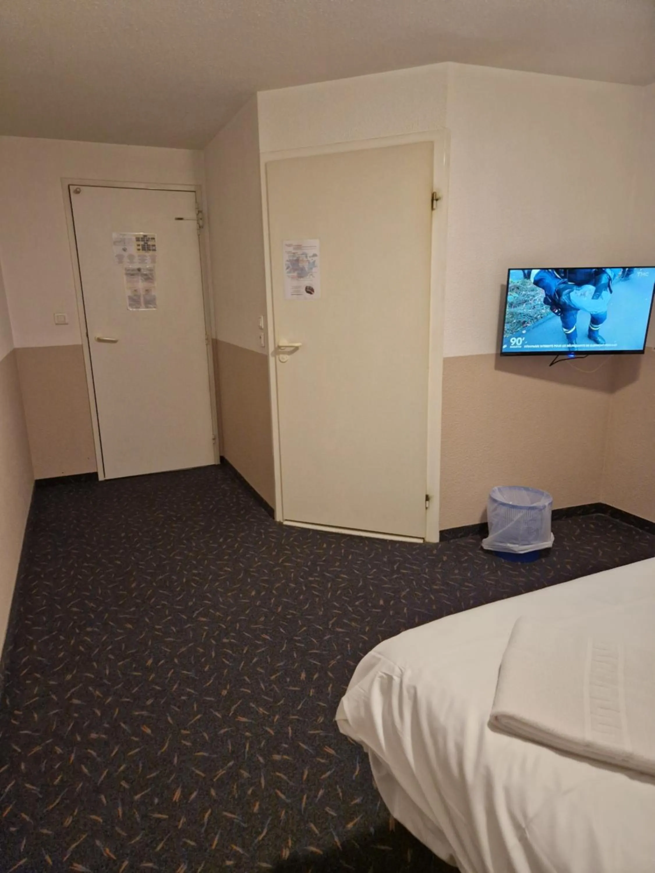 Bed in Quick Palace Vannes