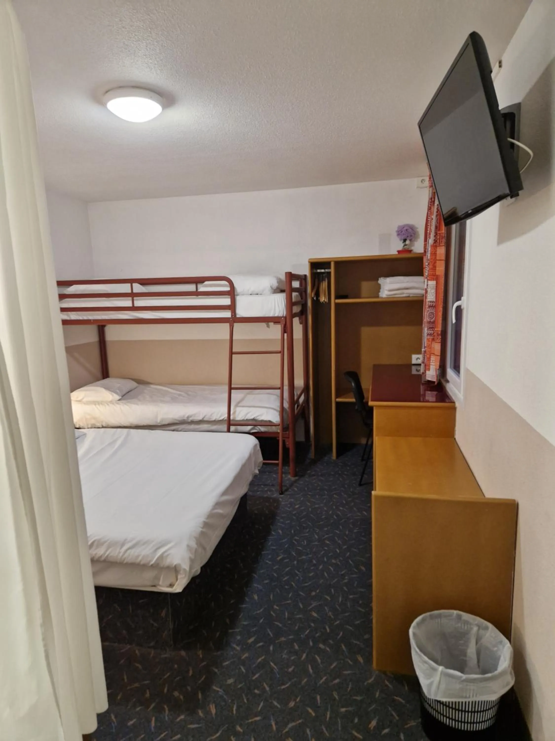 Bed in Quick Palace Vannes