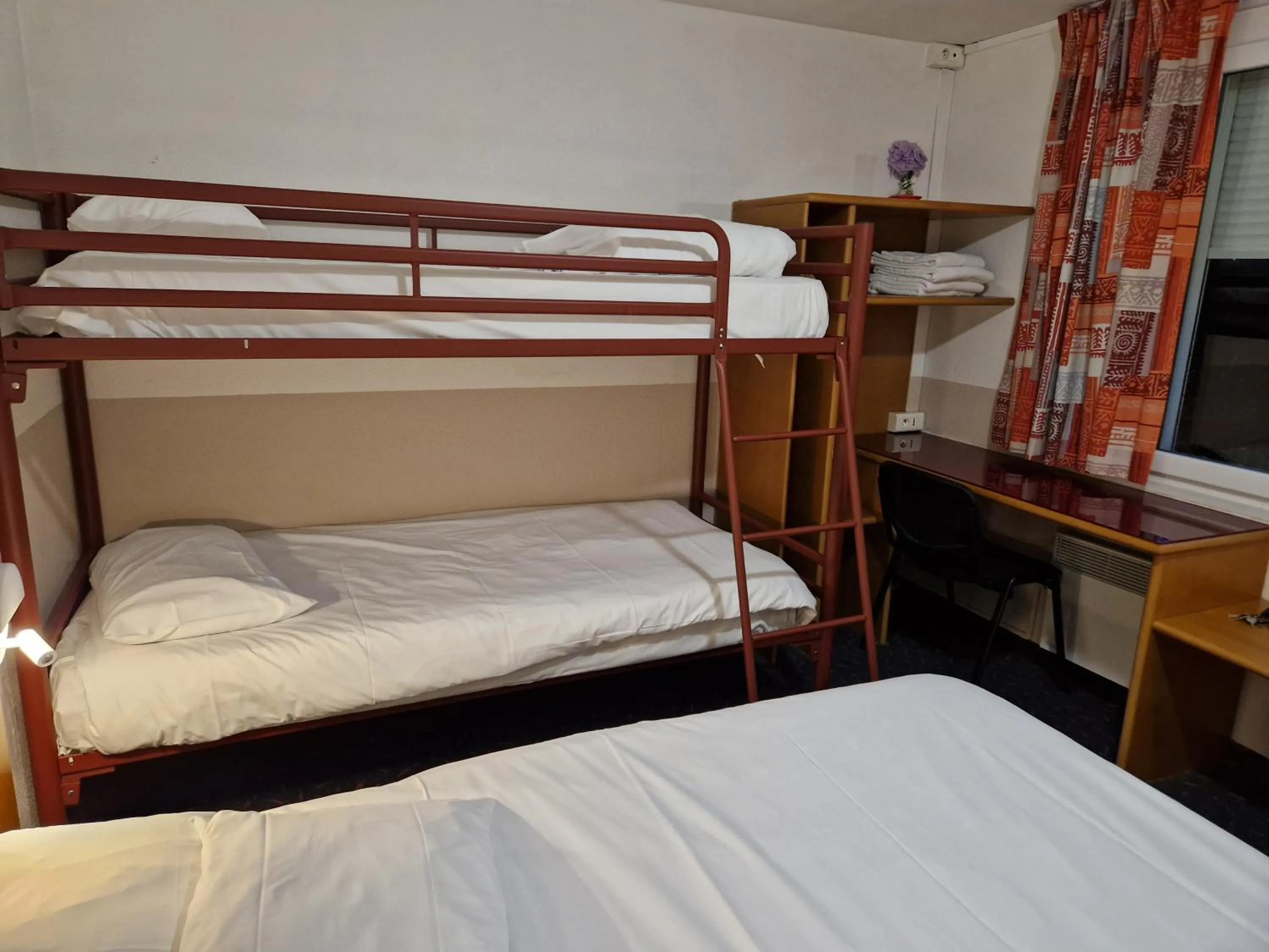 Bed in Quick Palace Vannes