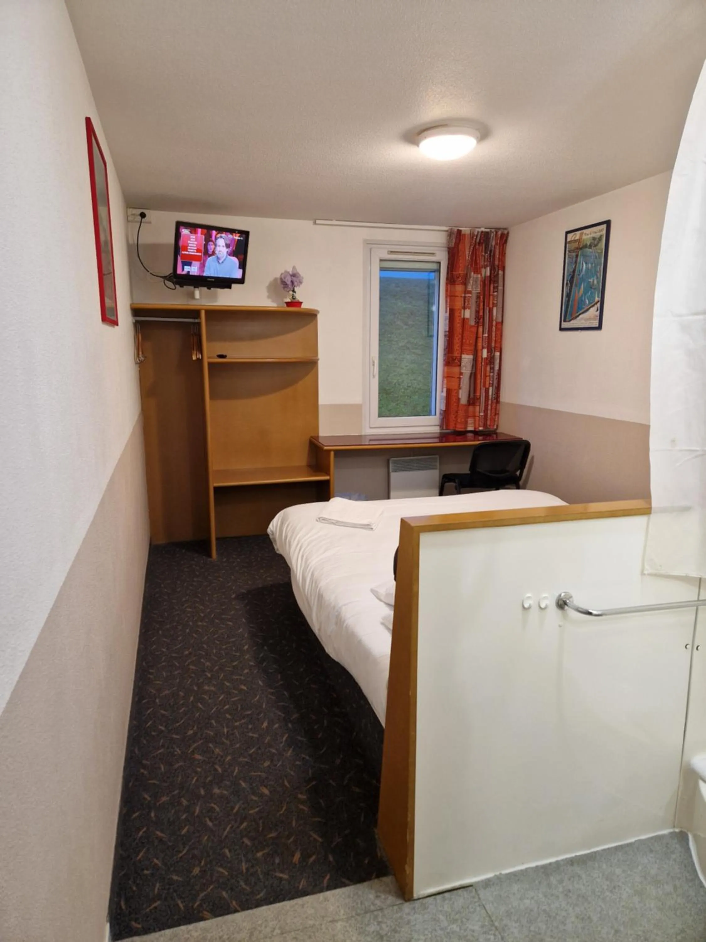 Bed in Quick Palace Vannes