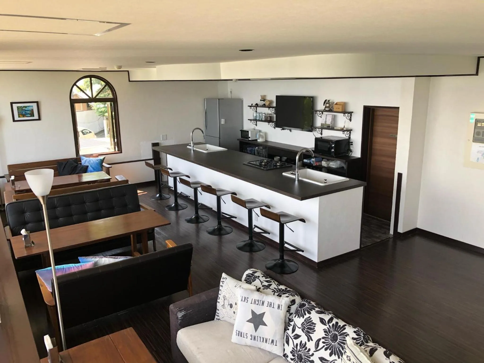 Communal lounge/ TV room in The Little Garden