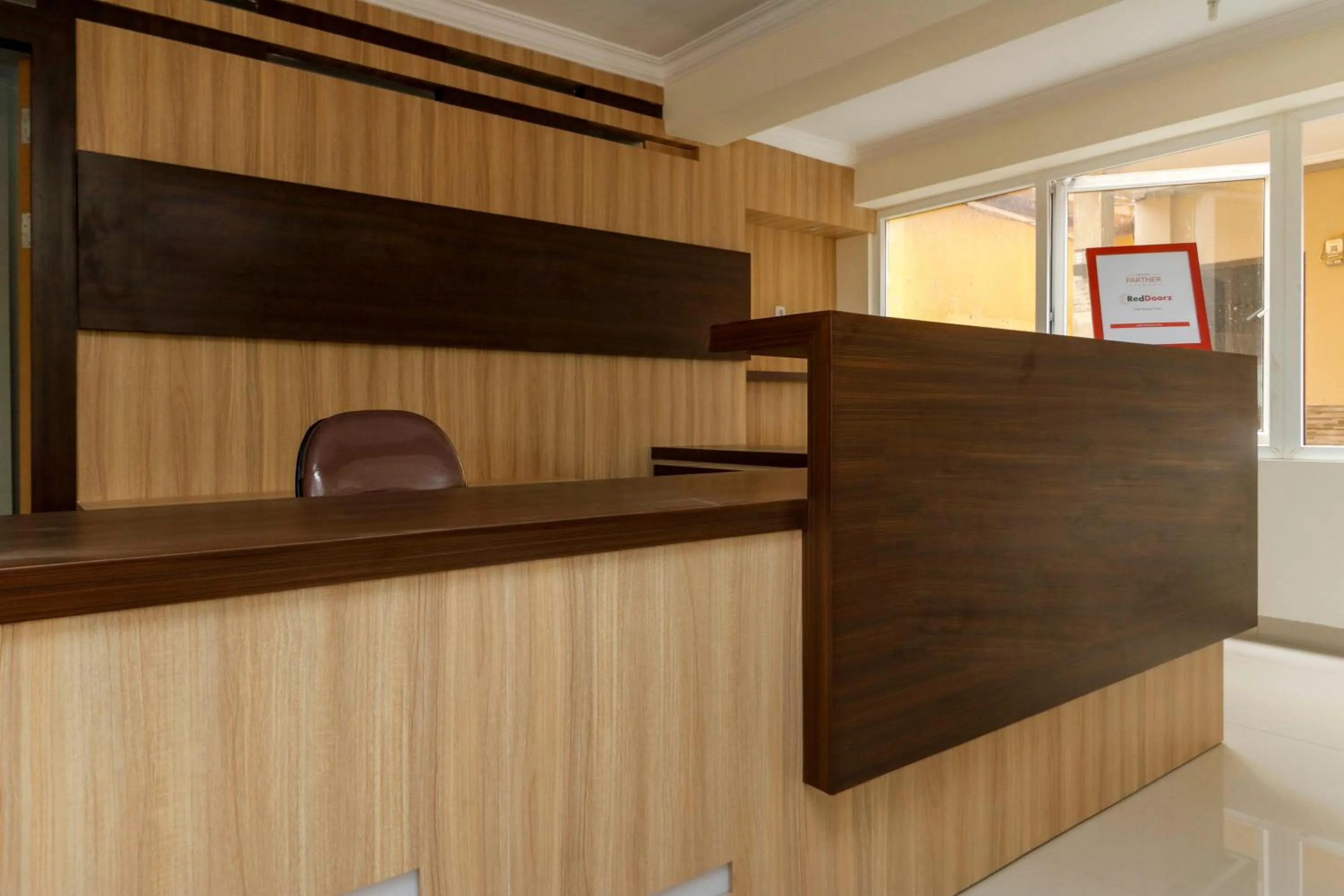 Lobby or reception in RedDoorz Plus near Palembang Square Mall