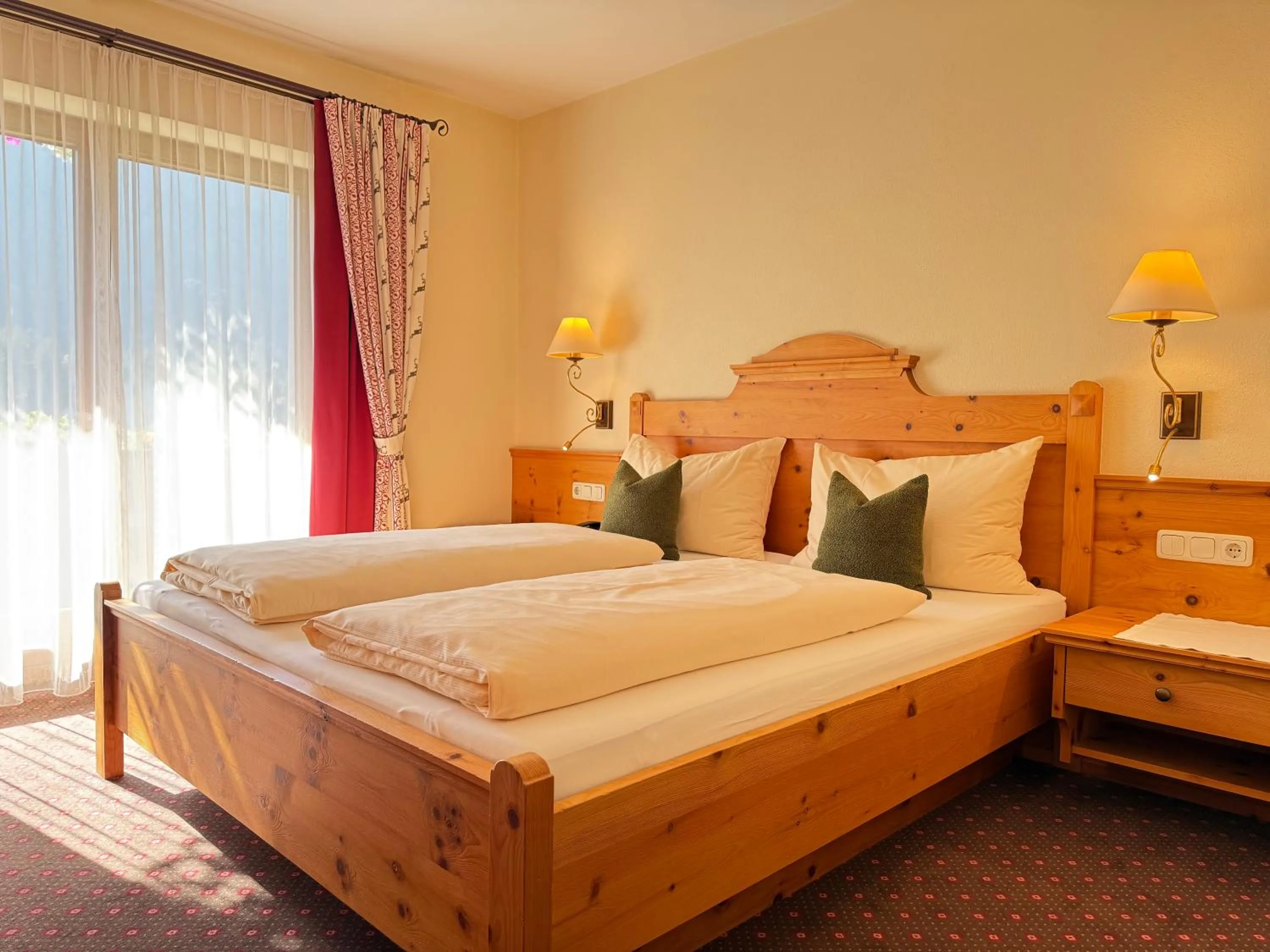 Bed in Hotel Neuwirt