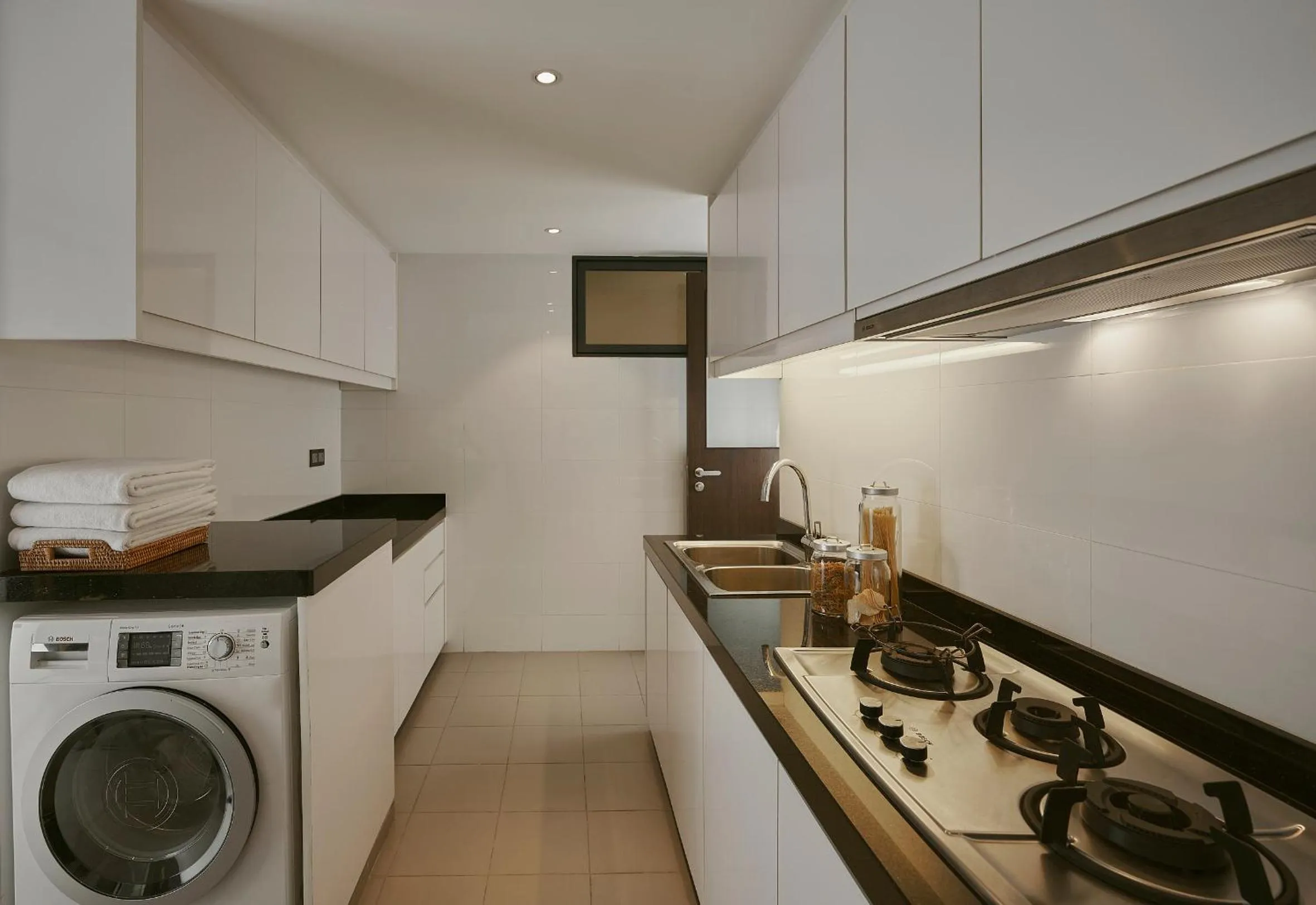 Kitchen or kitchenette in TRILLION SUITES by SLG