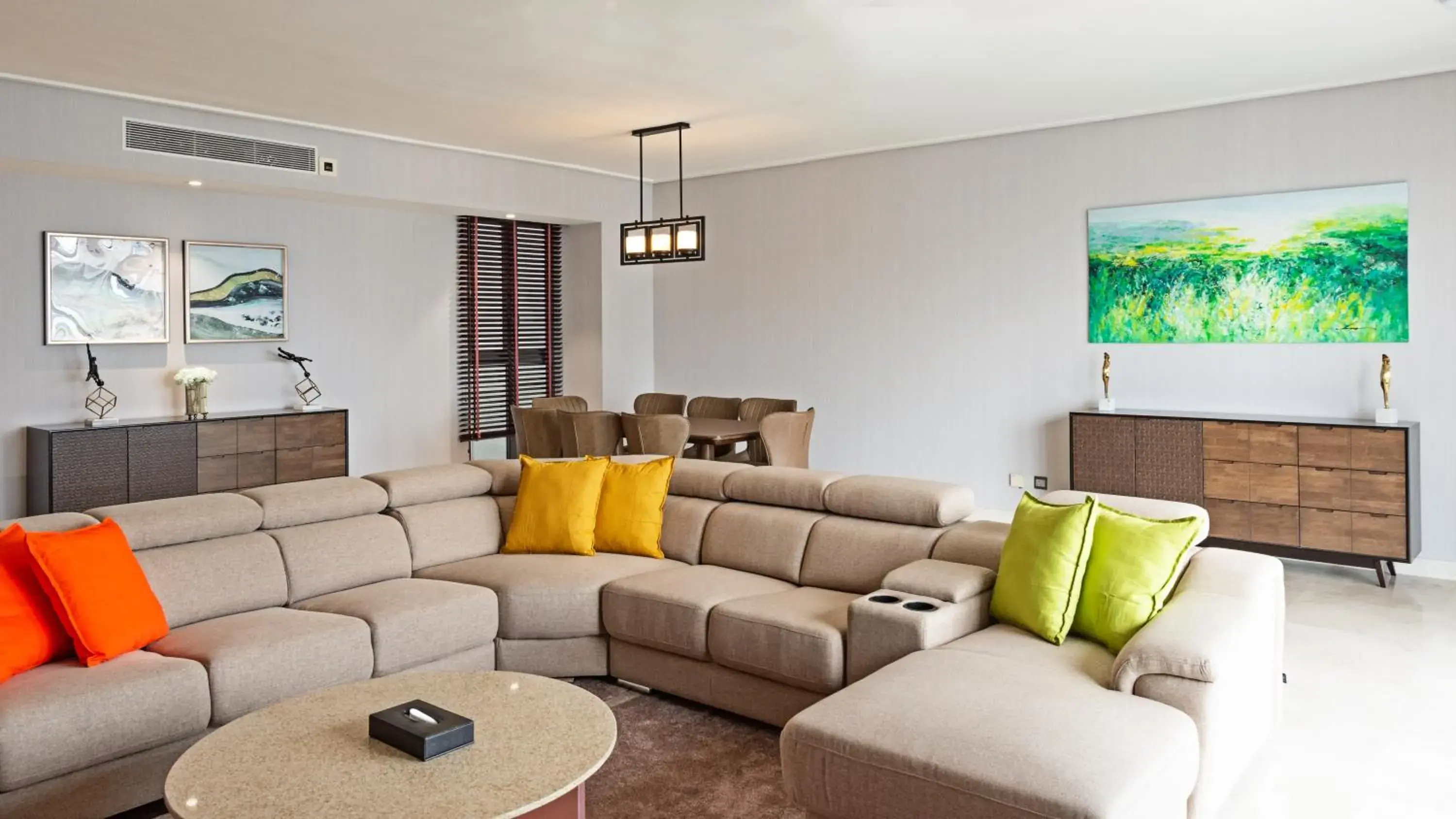 Living room in TRILLION SUITES by SLG Living room in TRILLION SUITES by SLG