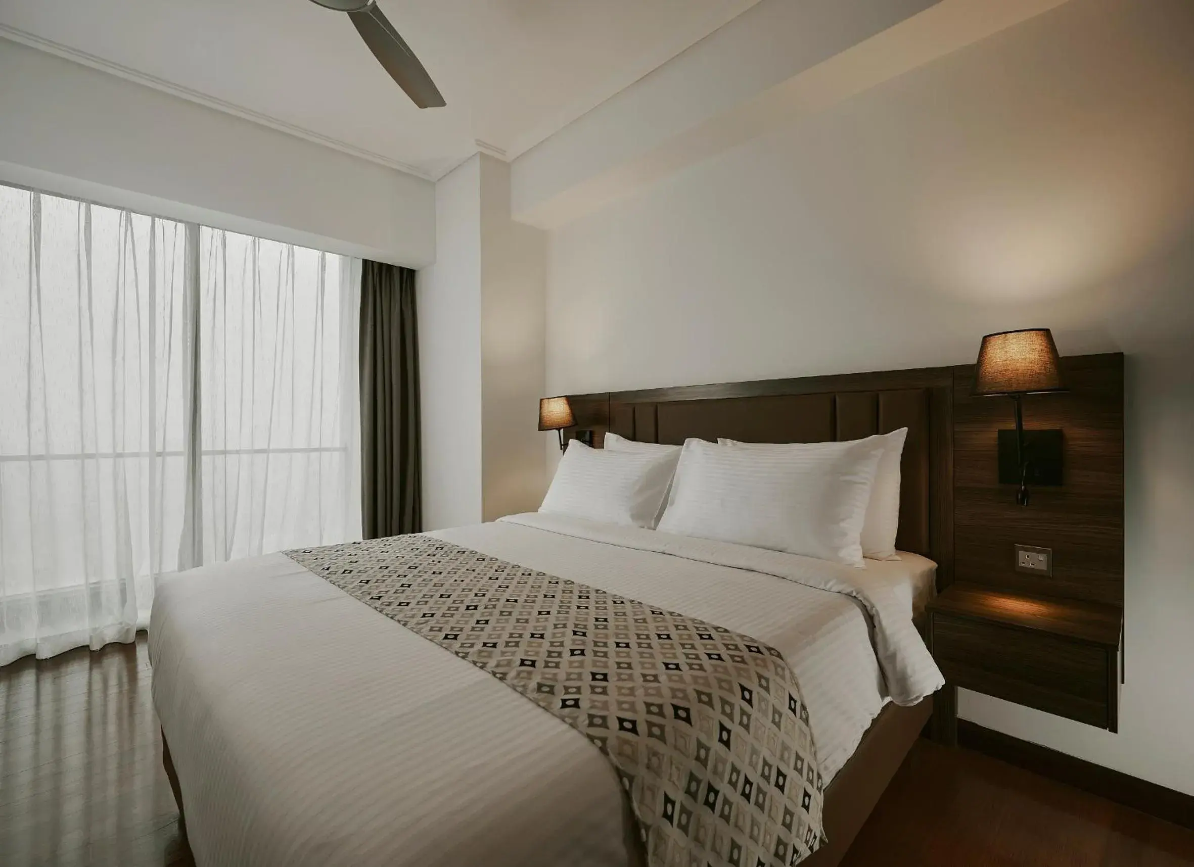 Bed in TRILLION SUITES by SLG Bed in TRILLION SUITES by SLG