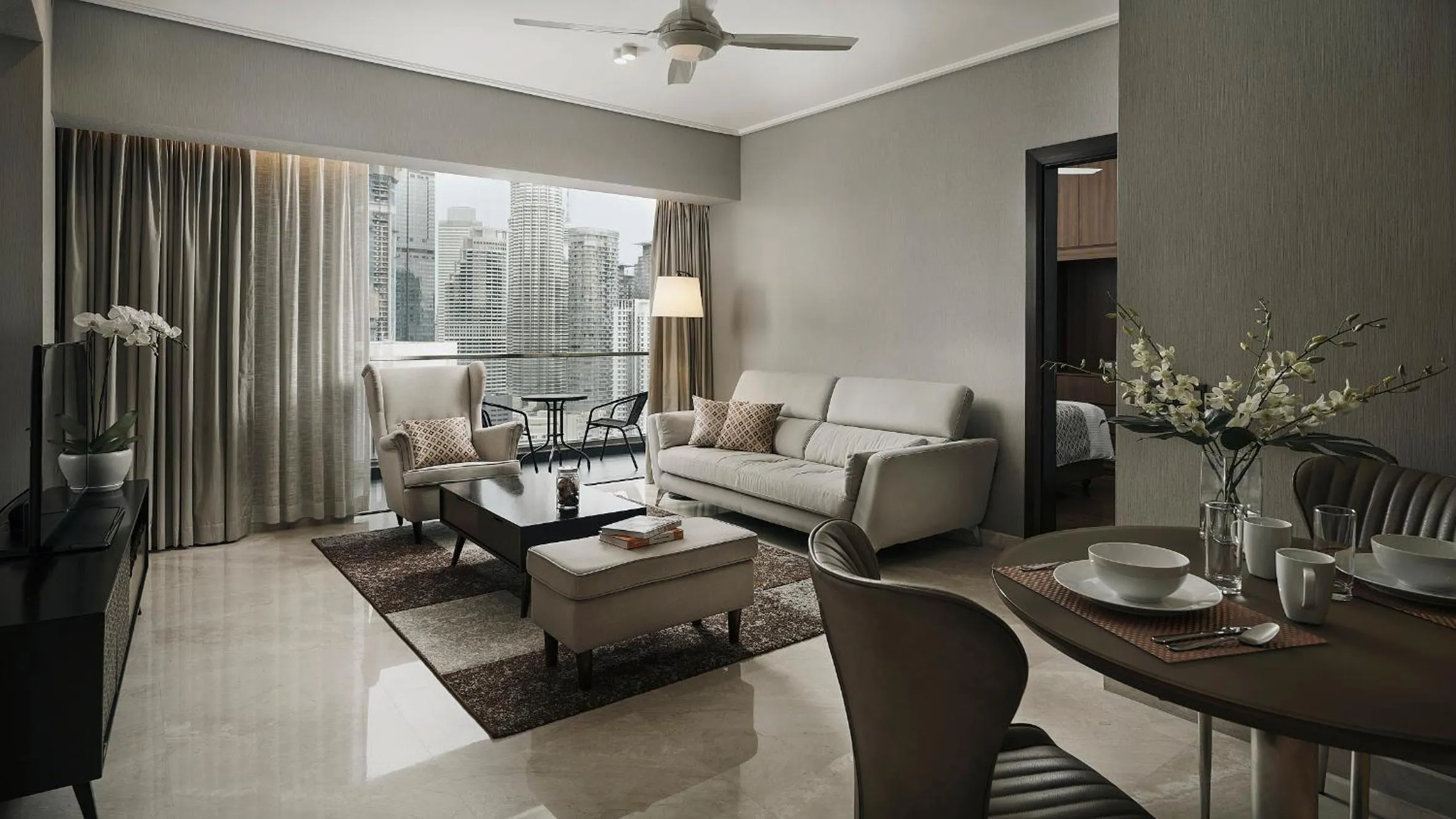 Living room in TRILLION SUITES by SLG