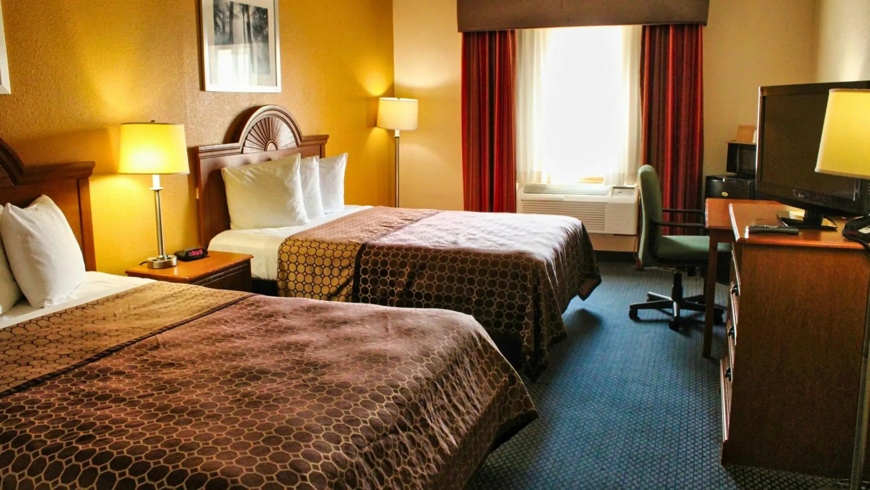 Photo of the whole room, Bed in Magnuson Hotel Sand Springs – Tulsa West Photo of the whole room, Bed in Magnuson Hotel Sand Springs – Tulsa West