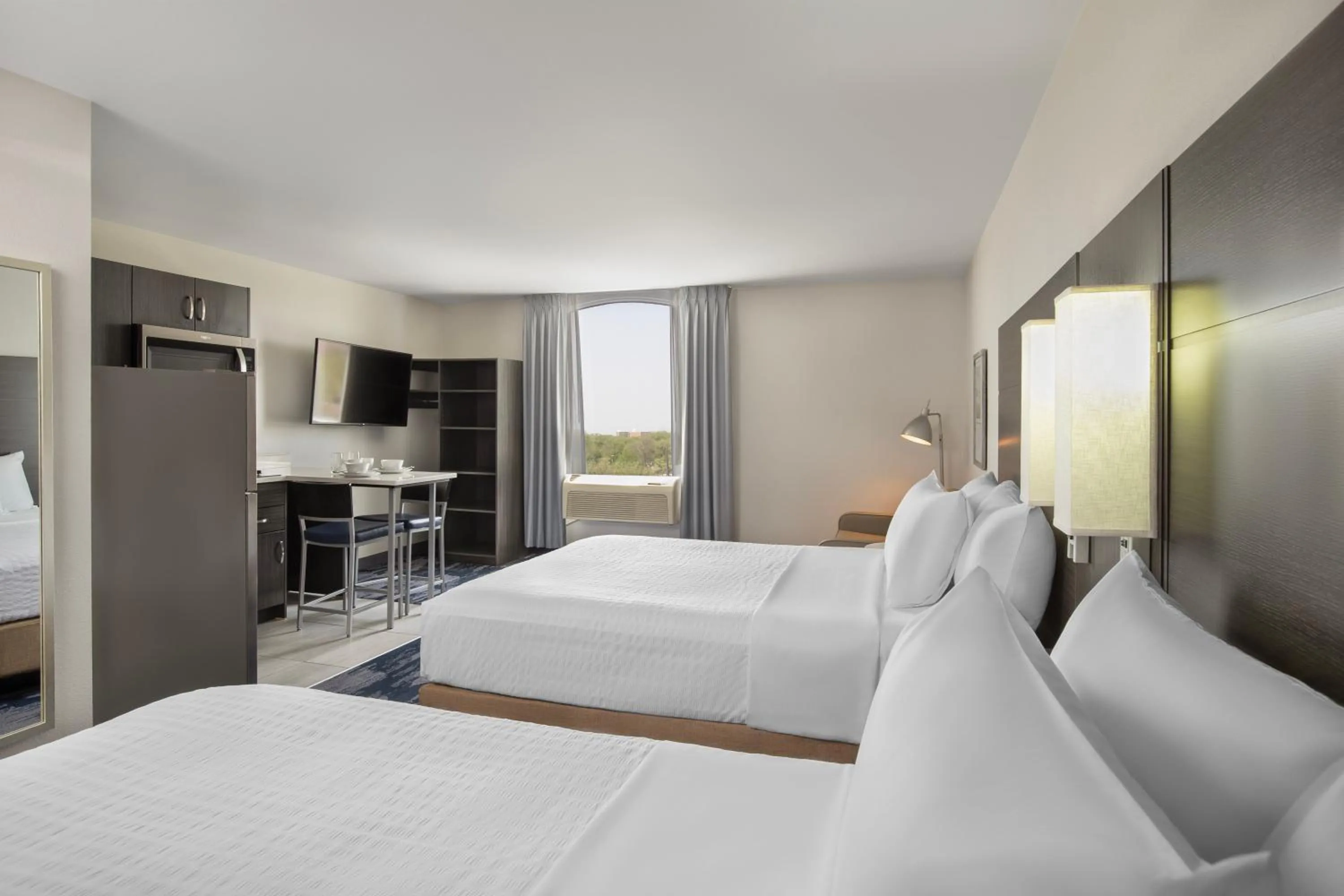 Bed in Quality Inn & Suites