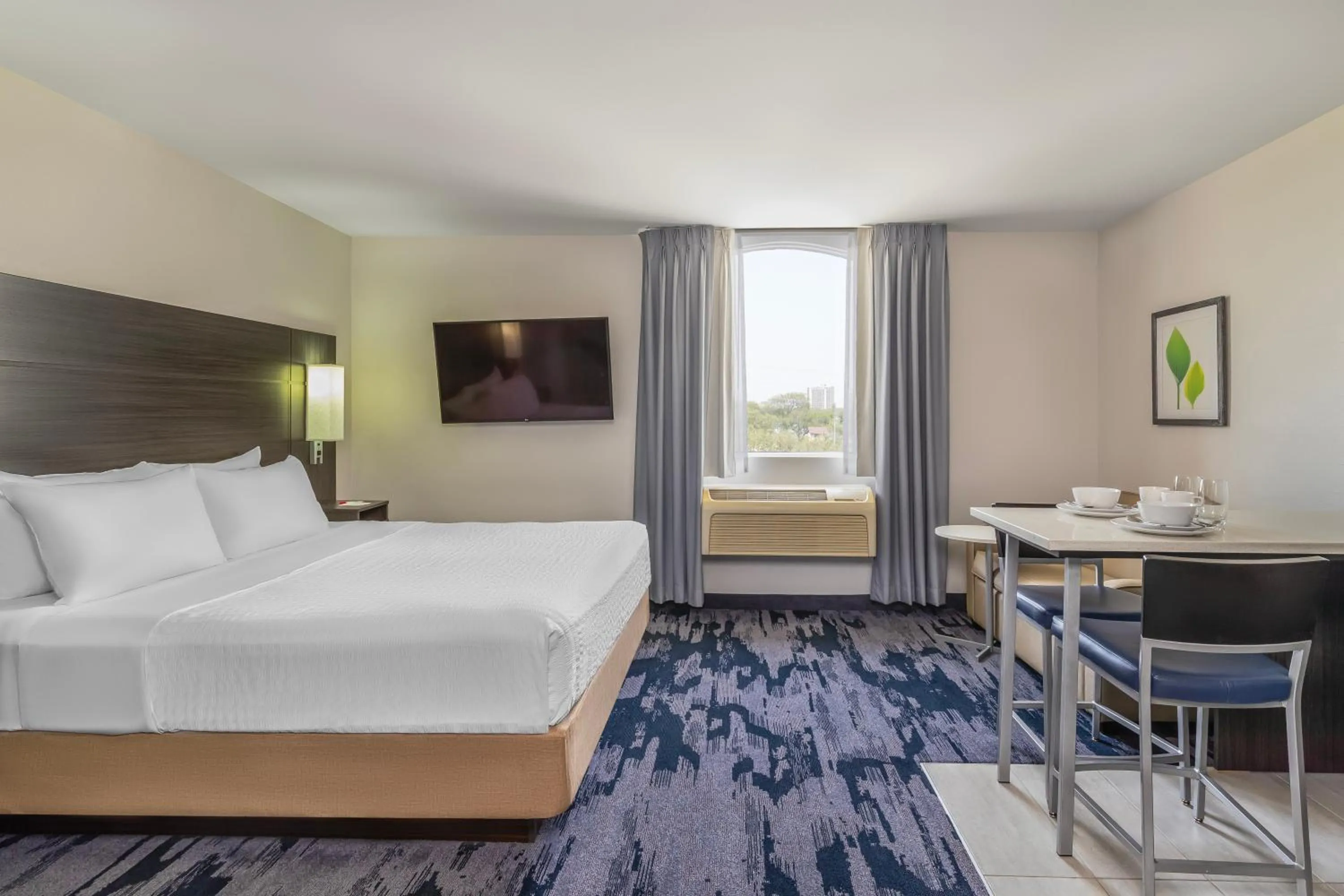 Bed in Quality Inn & Suites