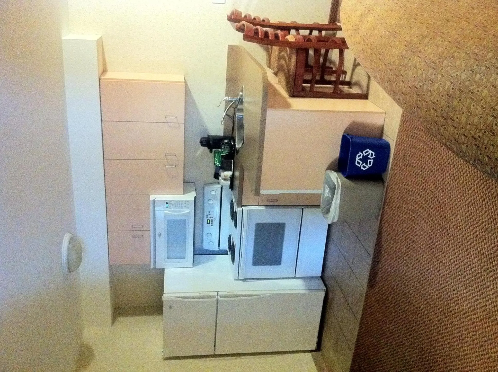 Kitchen or kitchenette in Super 8 by Wyndham Grande Prairie