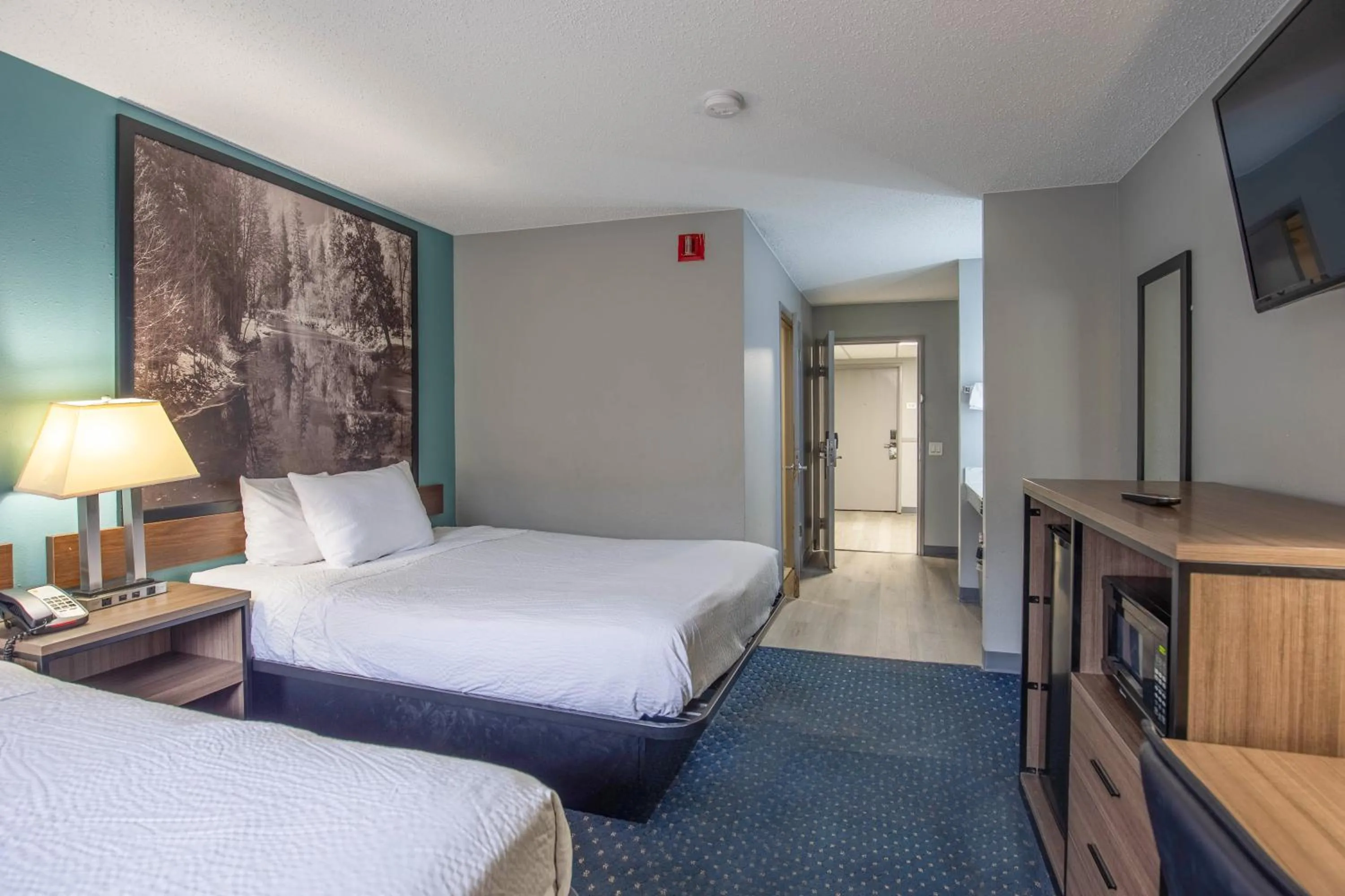 Bed in Super 8 by Wyndham Rockford I-90 Casino District