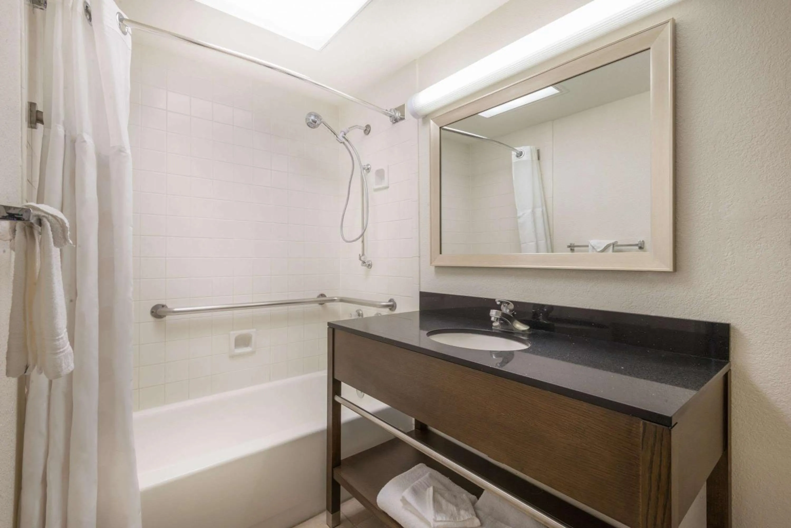 Bathroom in Ramada by Wyndham Albuquerque Airport