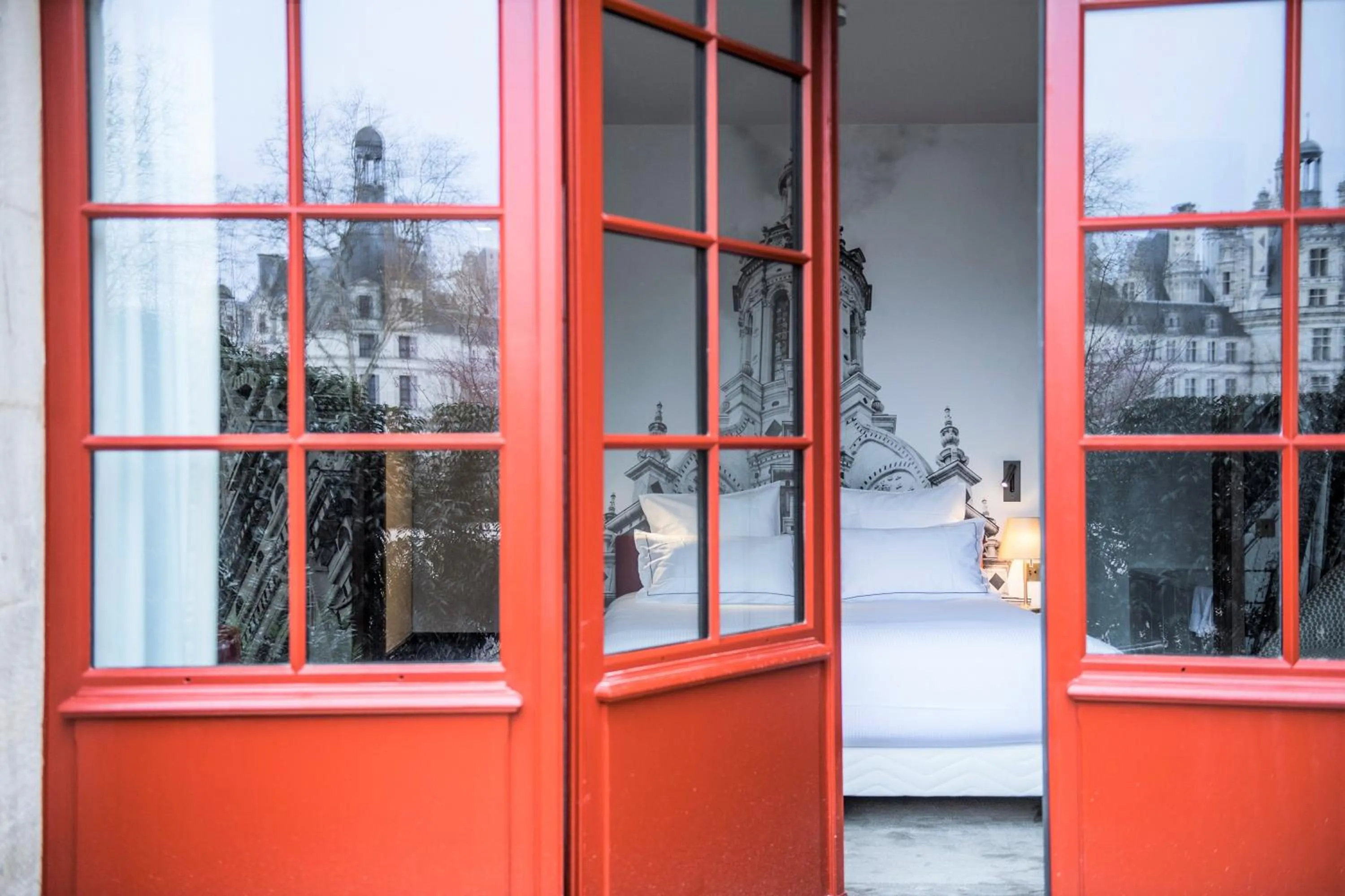Bed in Relais de Chambord, a Small Luxury Hotels of the World