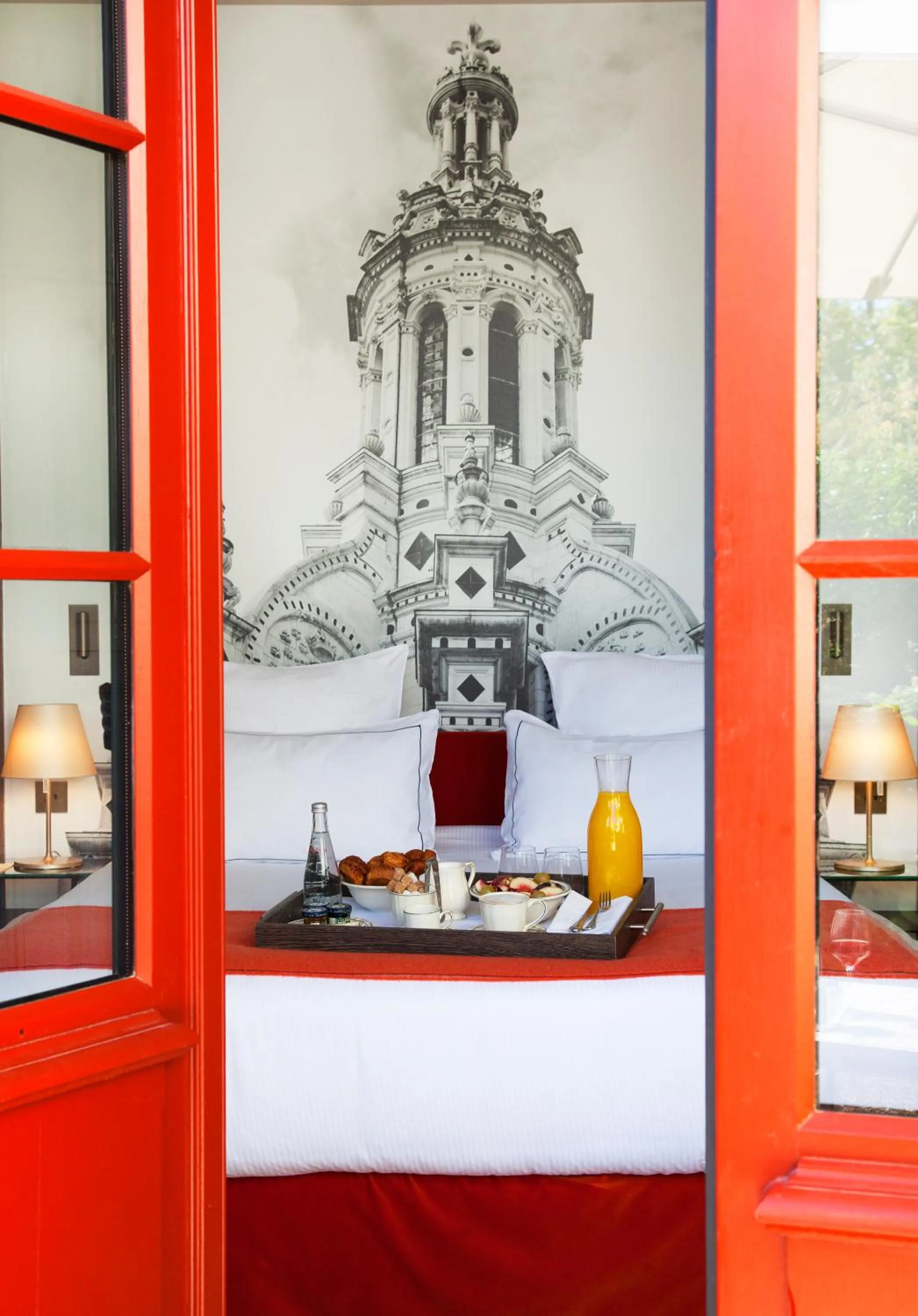 Bed in Relais de Chambord, a Small Luxury Hotels of the World