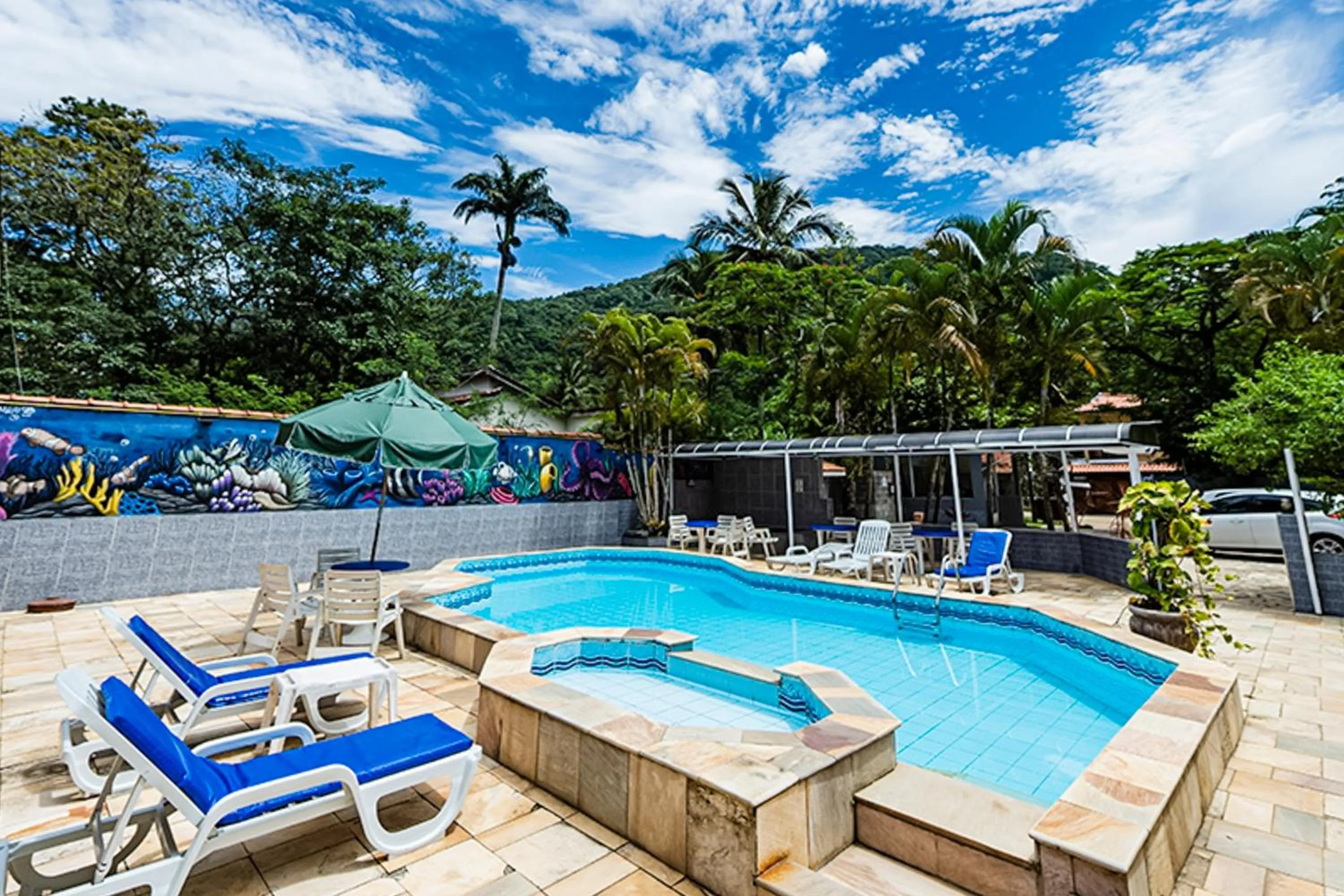 Swimming pool in VELINN Pousada Ubatuba Tropical