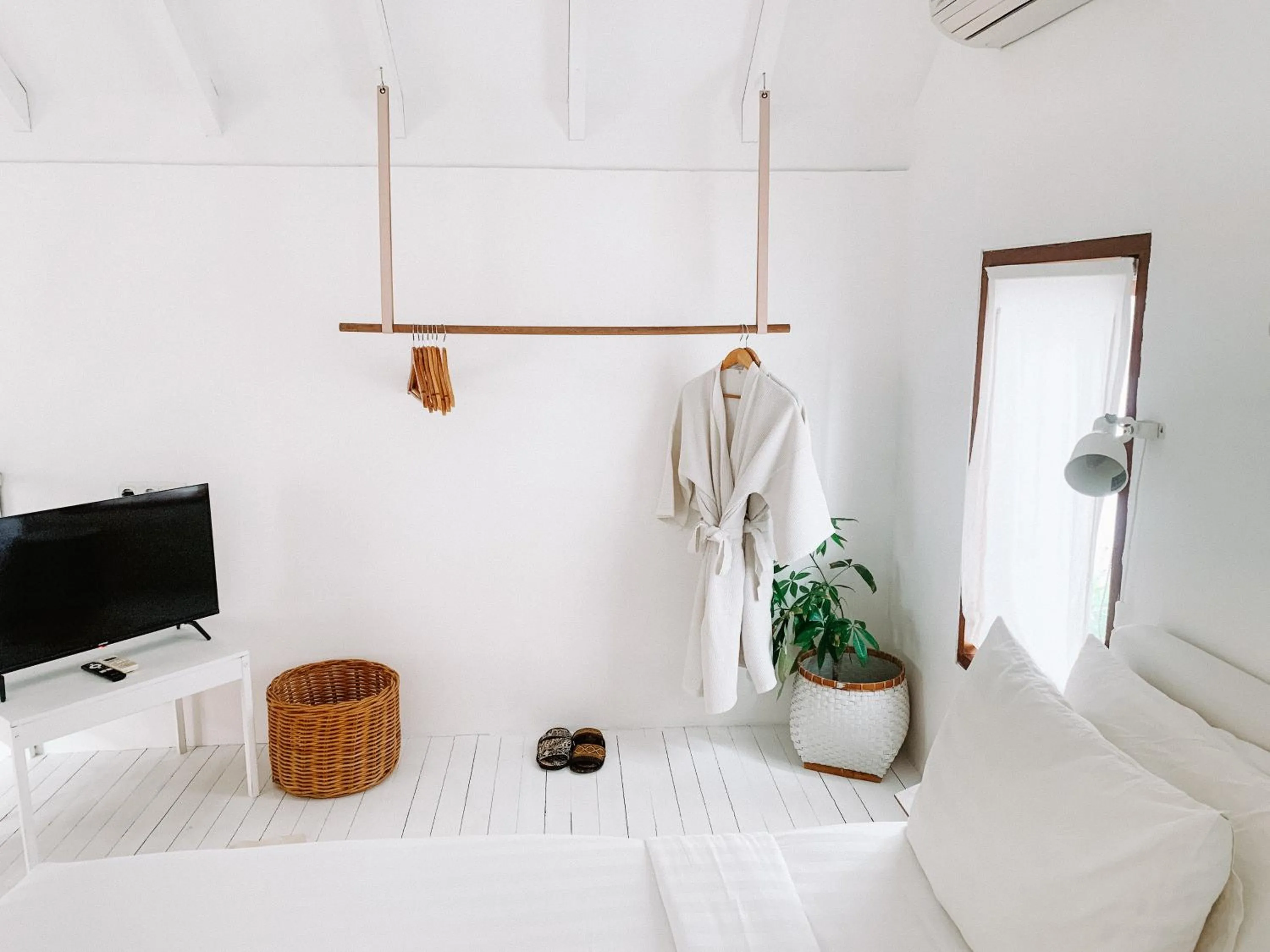 Bed in Happy Together By Kresna Hospitality