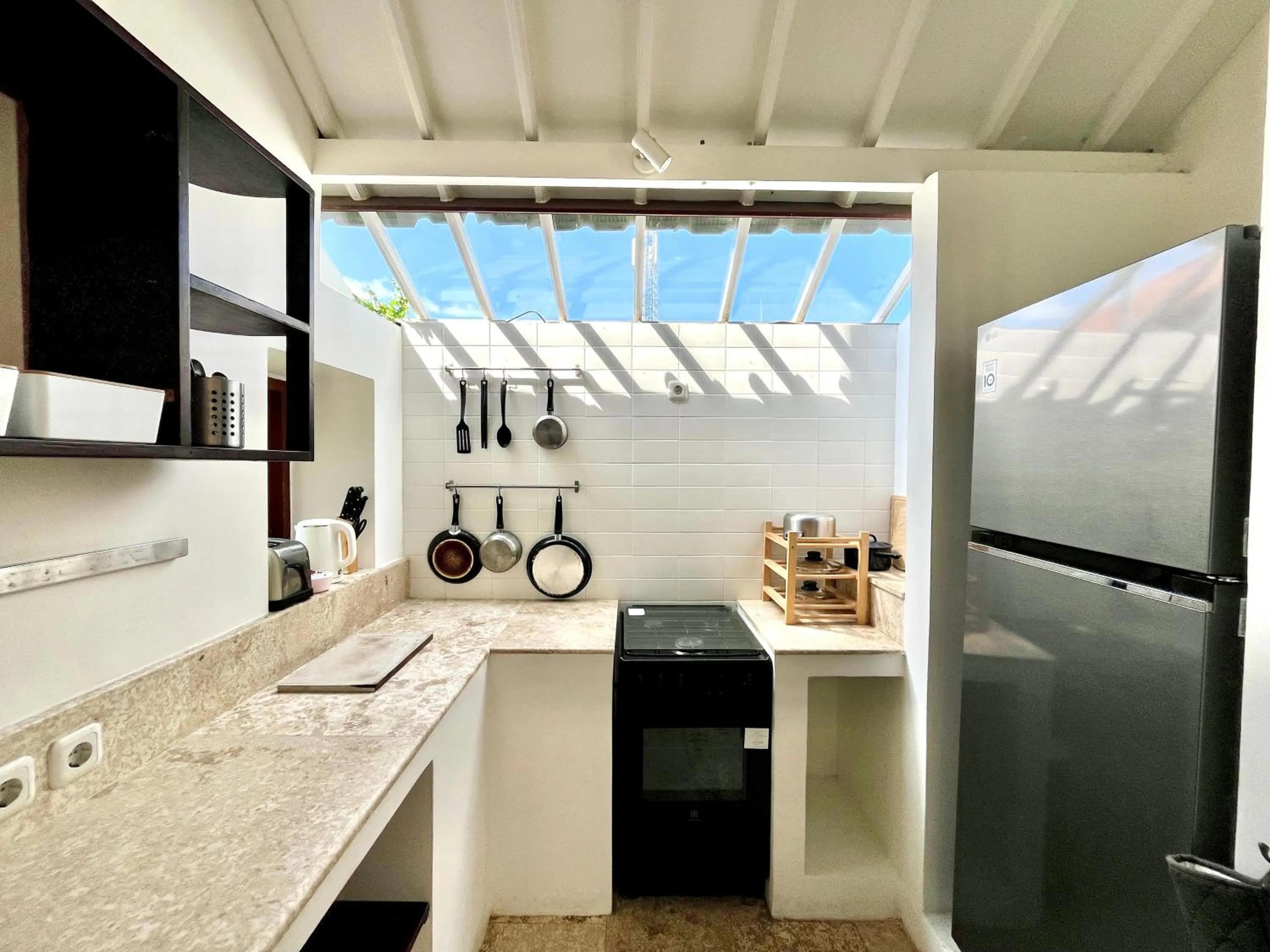 kitchen in Happy Together By Kresna Hospitality