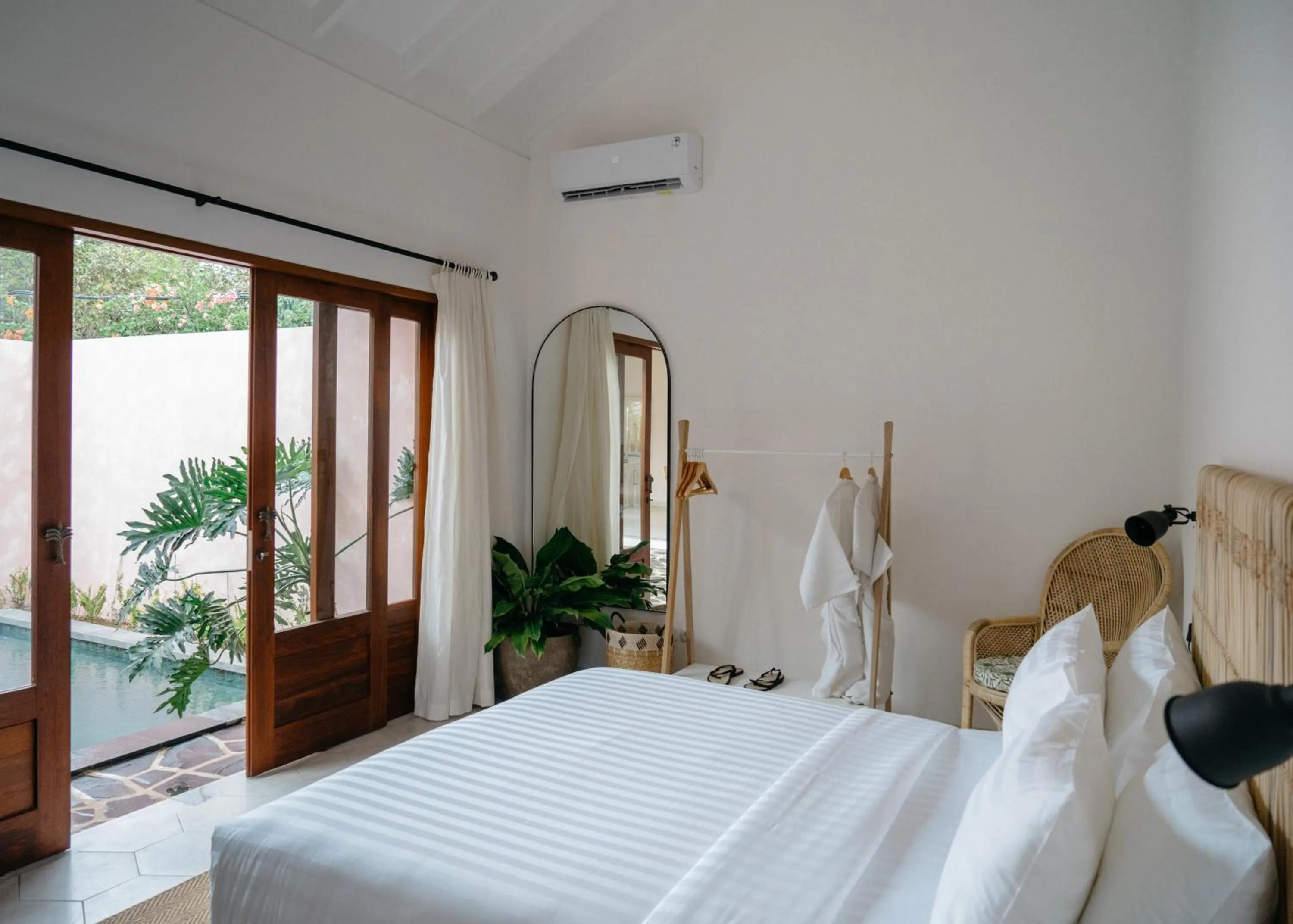 Bed in Happy Together By Kresna Hospitality