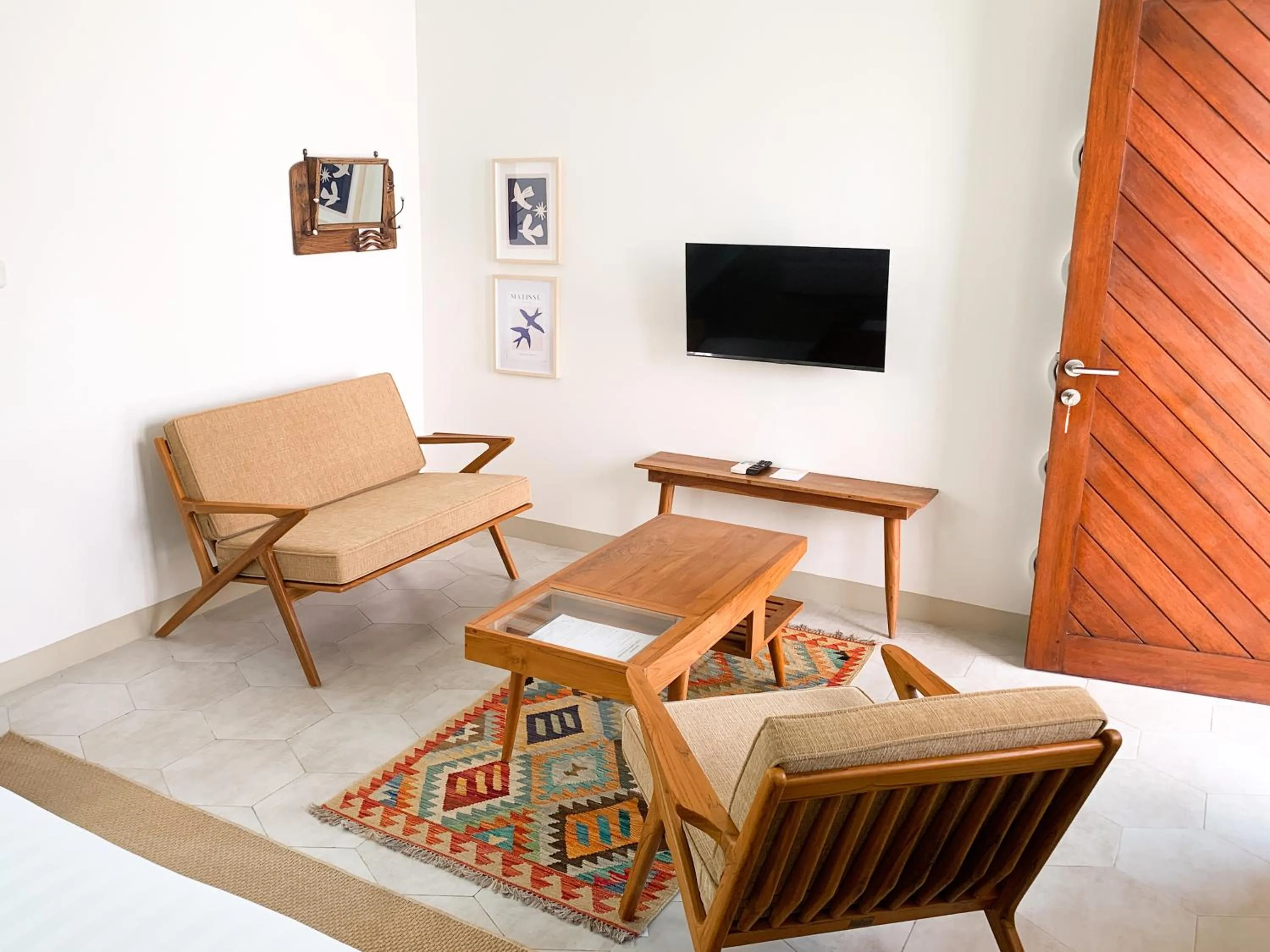 Communal lounge/ TV room in Happy Together By Kresna Hospitality