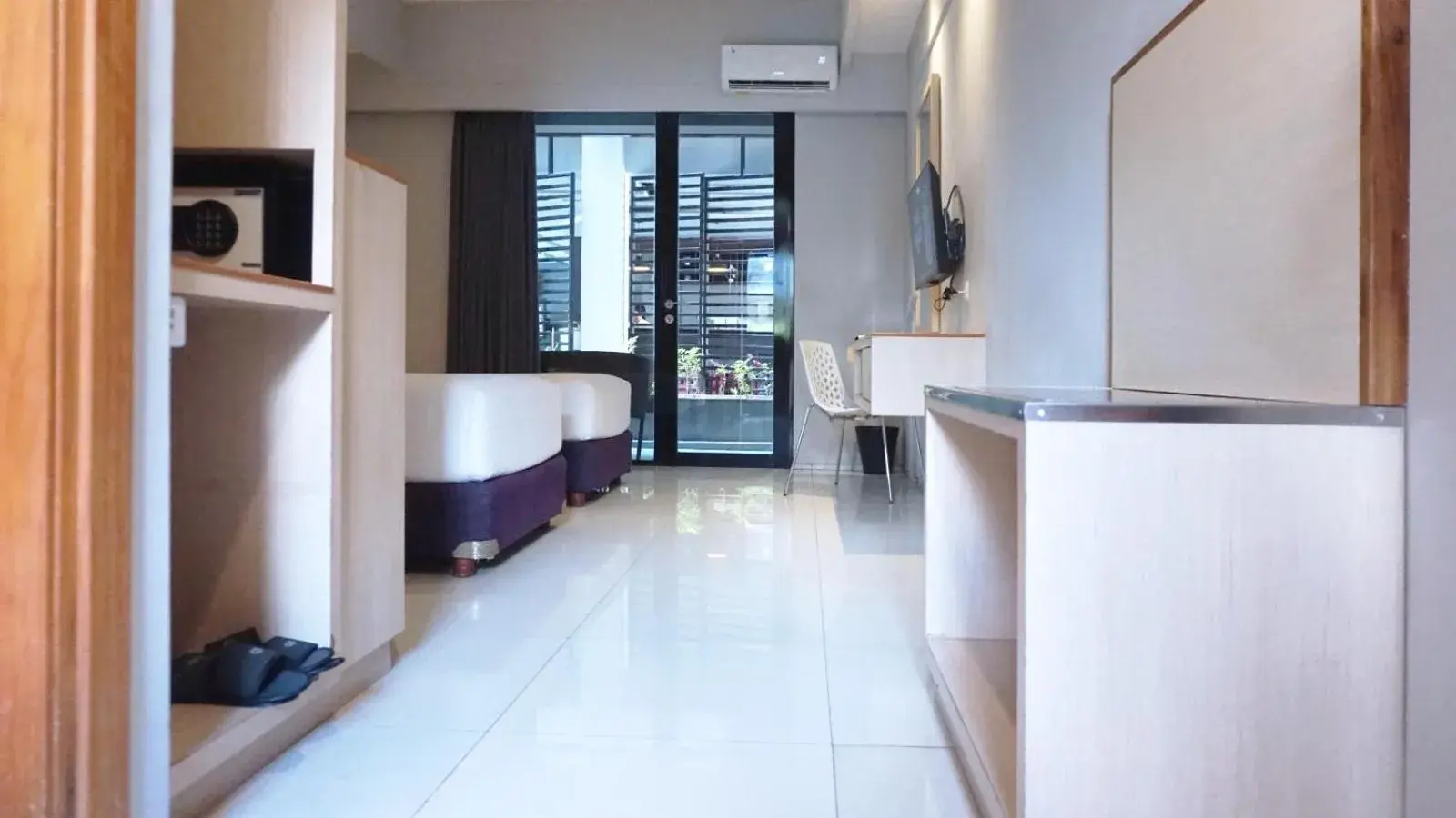 Bed in Conjioo Hotel Kuta Managed By MHM Bed in Conjioo Hotel Kuta Managed By MHM