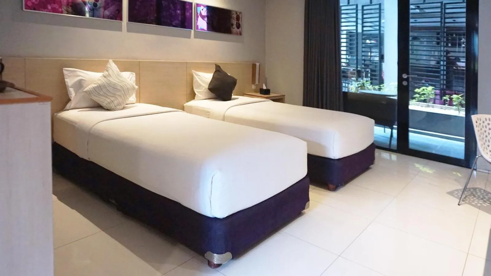 Bed in Conjioo Hotel Kuta Managed By MHM