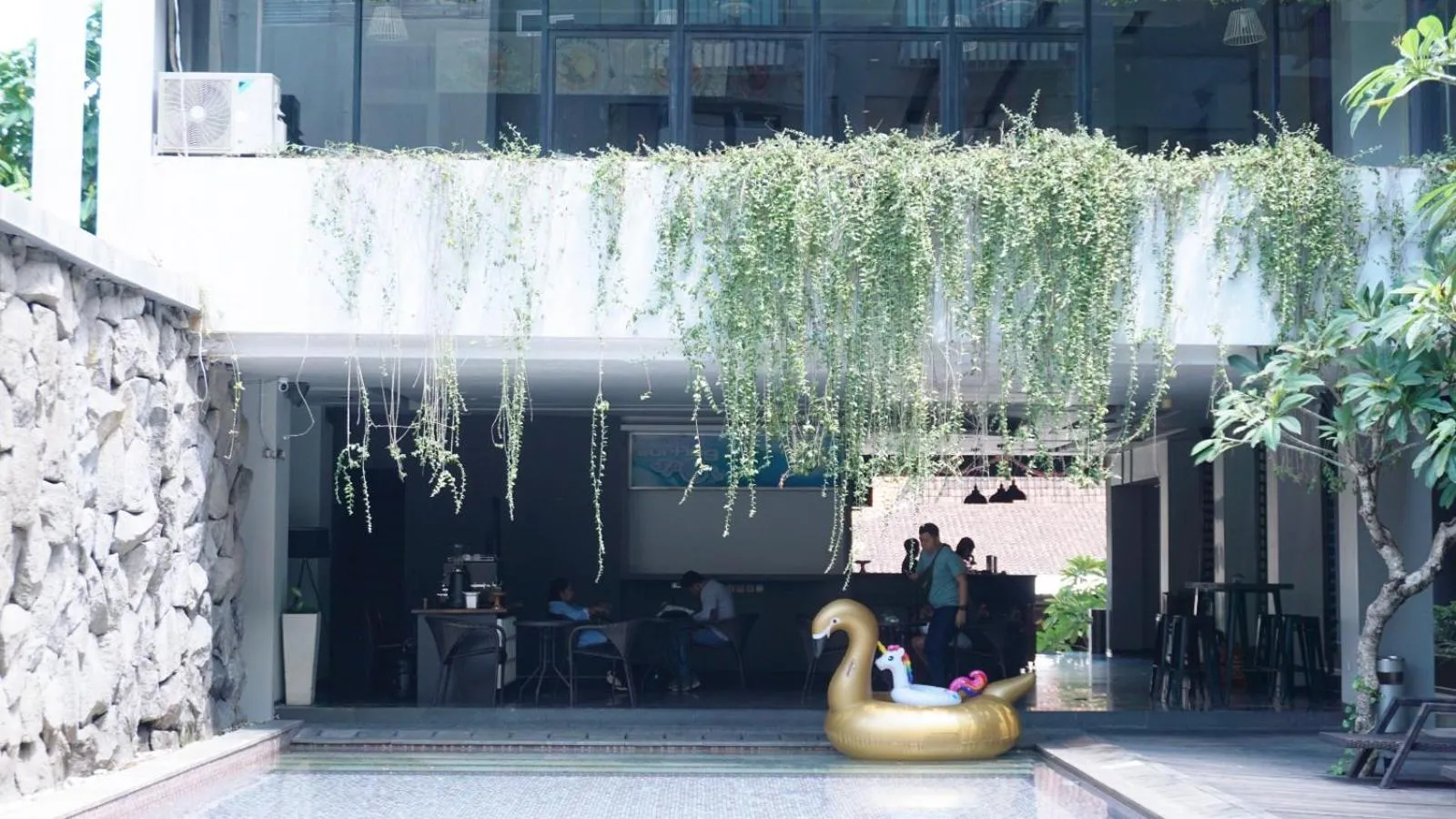 Swimming pool in Conjioo Hotel Kuta Managed By MHM