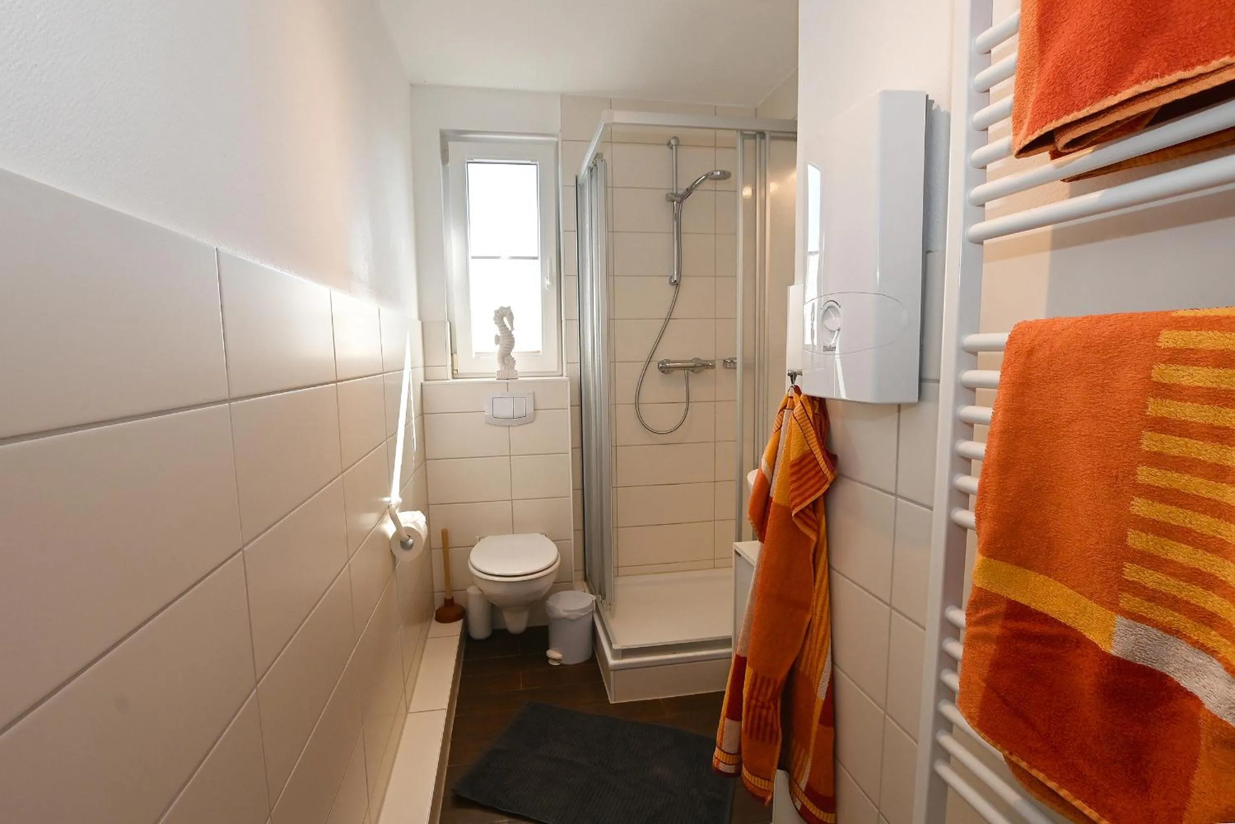 Bathroom in Ferienwohnung NORDIA Allee und See