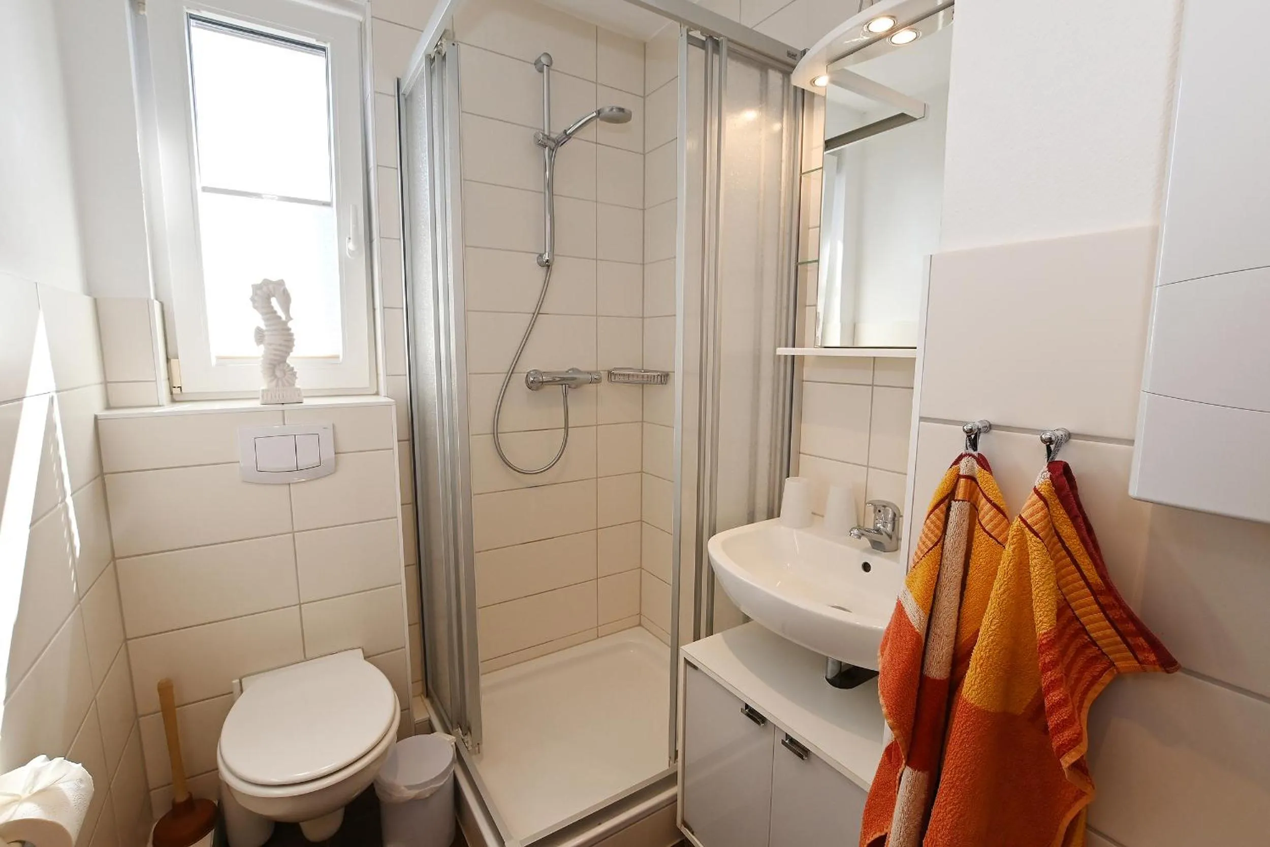 Bathroom in Ferienwohnung NORDIA Allee und See