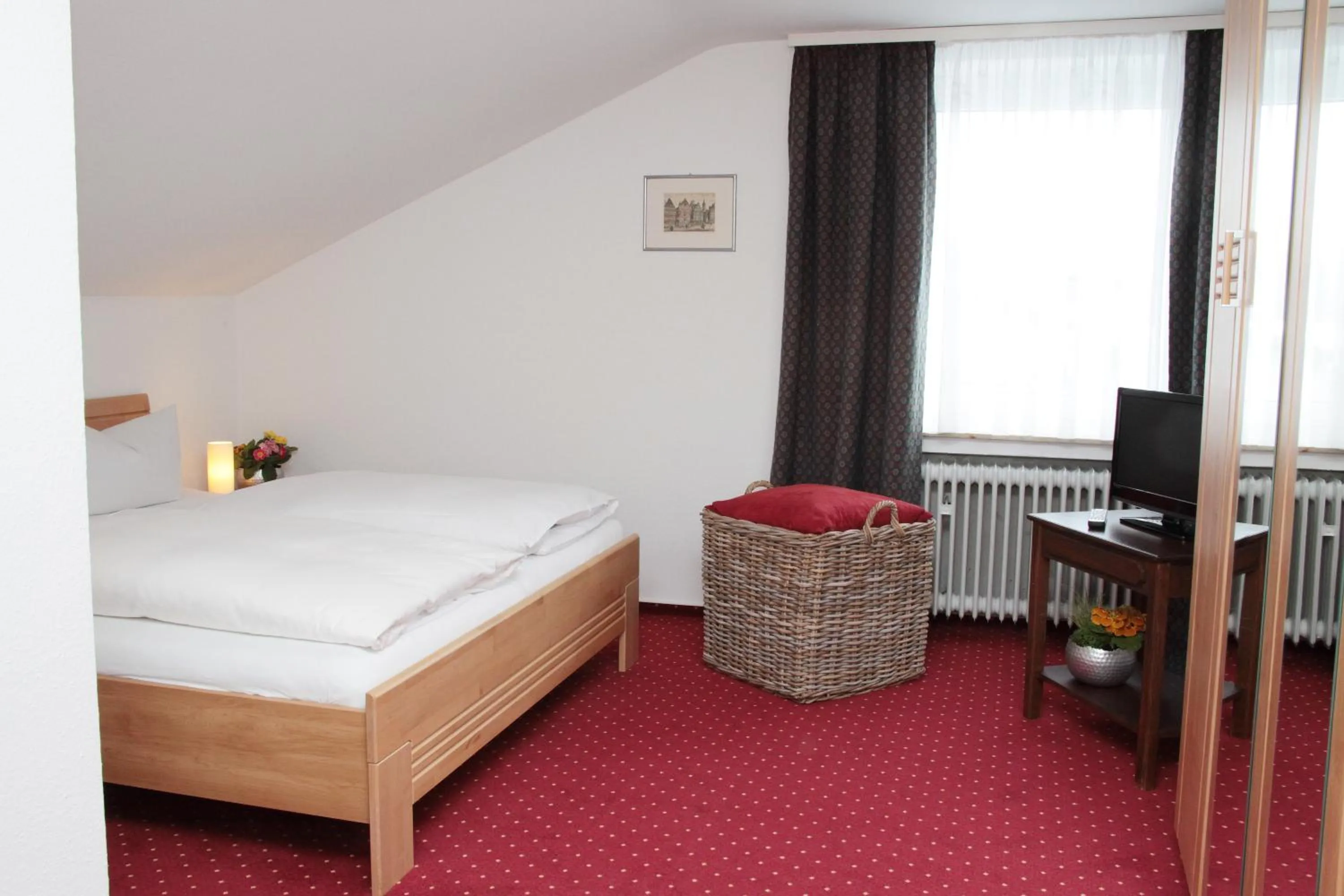 Photo of the whole room, Bed in Hotel an der Sonne & Restaurant Zum Schneiger