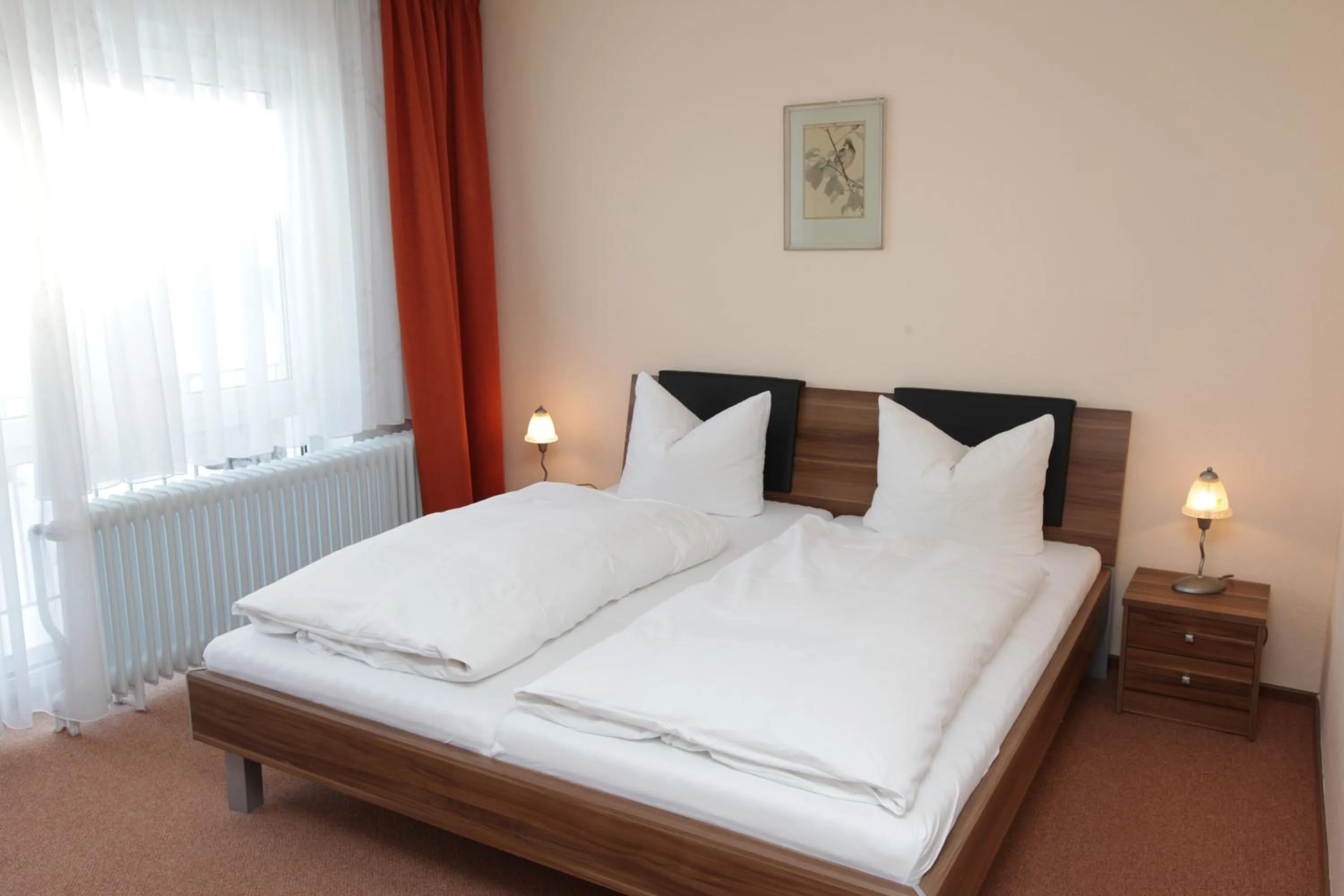 Bed in Hotel an der Sonne & Restaurant Zum Schneiger