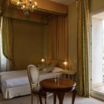 Bed in Hotel The Originals Château de Perigny