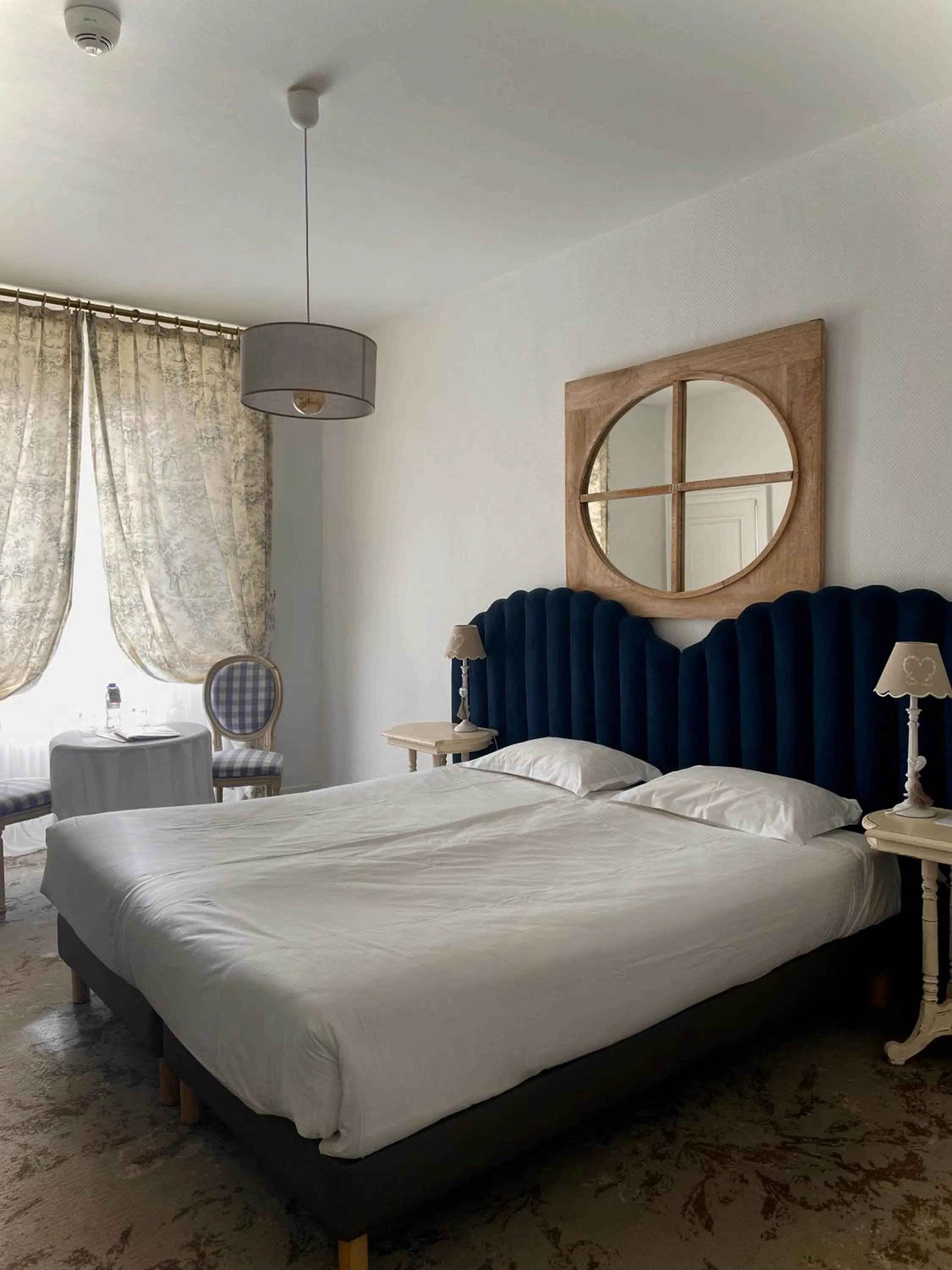 Bed in Hotel The Originals Château de Perigny