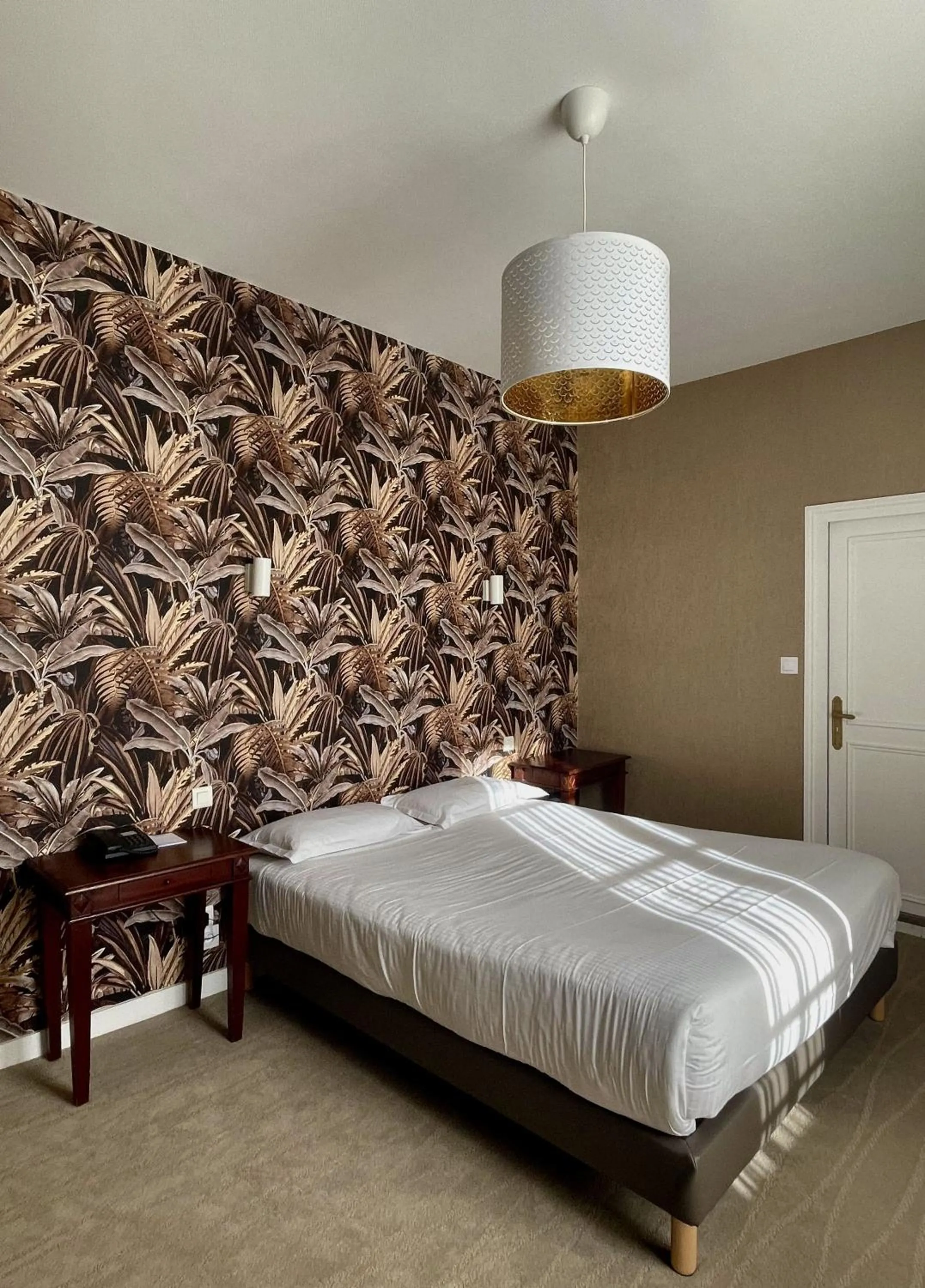 Bed in Hotel The Originals Château de Perigny