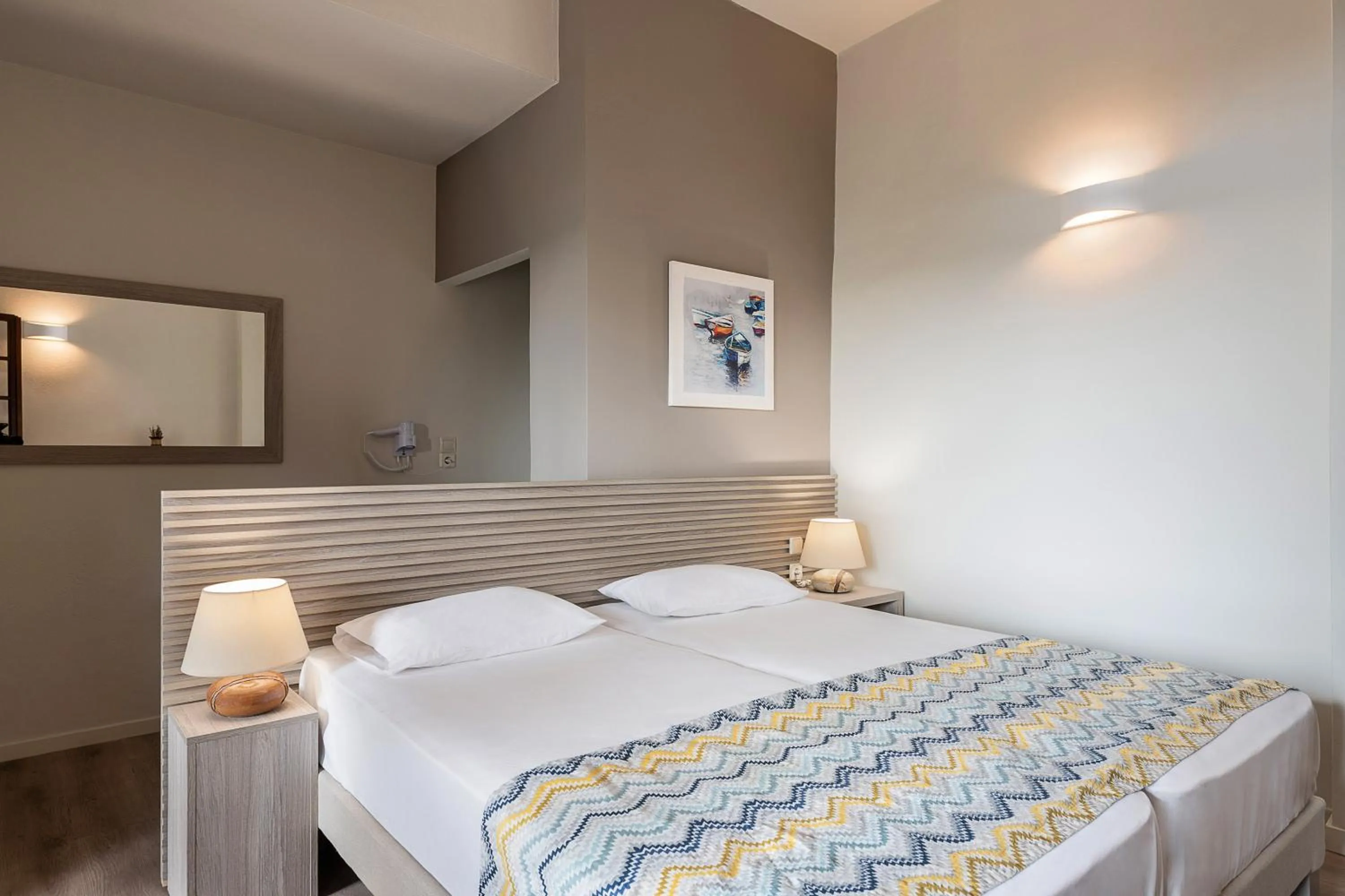 Bed in Alianthos Suites