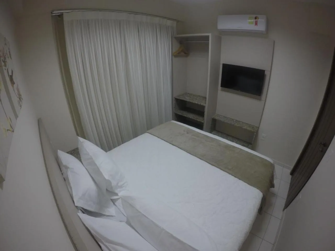 Bed in Pousada Doluar